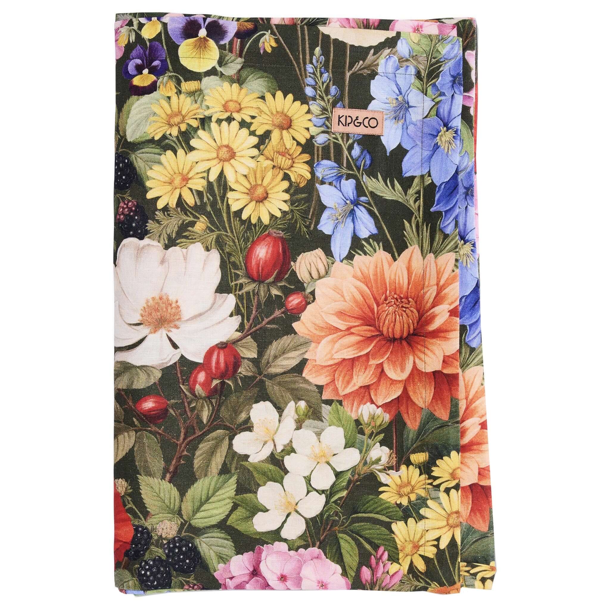 Alt Tag: Kip & Co Linen & Cotton Tablecloth - Cottage Garden Eden floral print tablecloth with vibrant wildflowers on dark green background