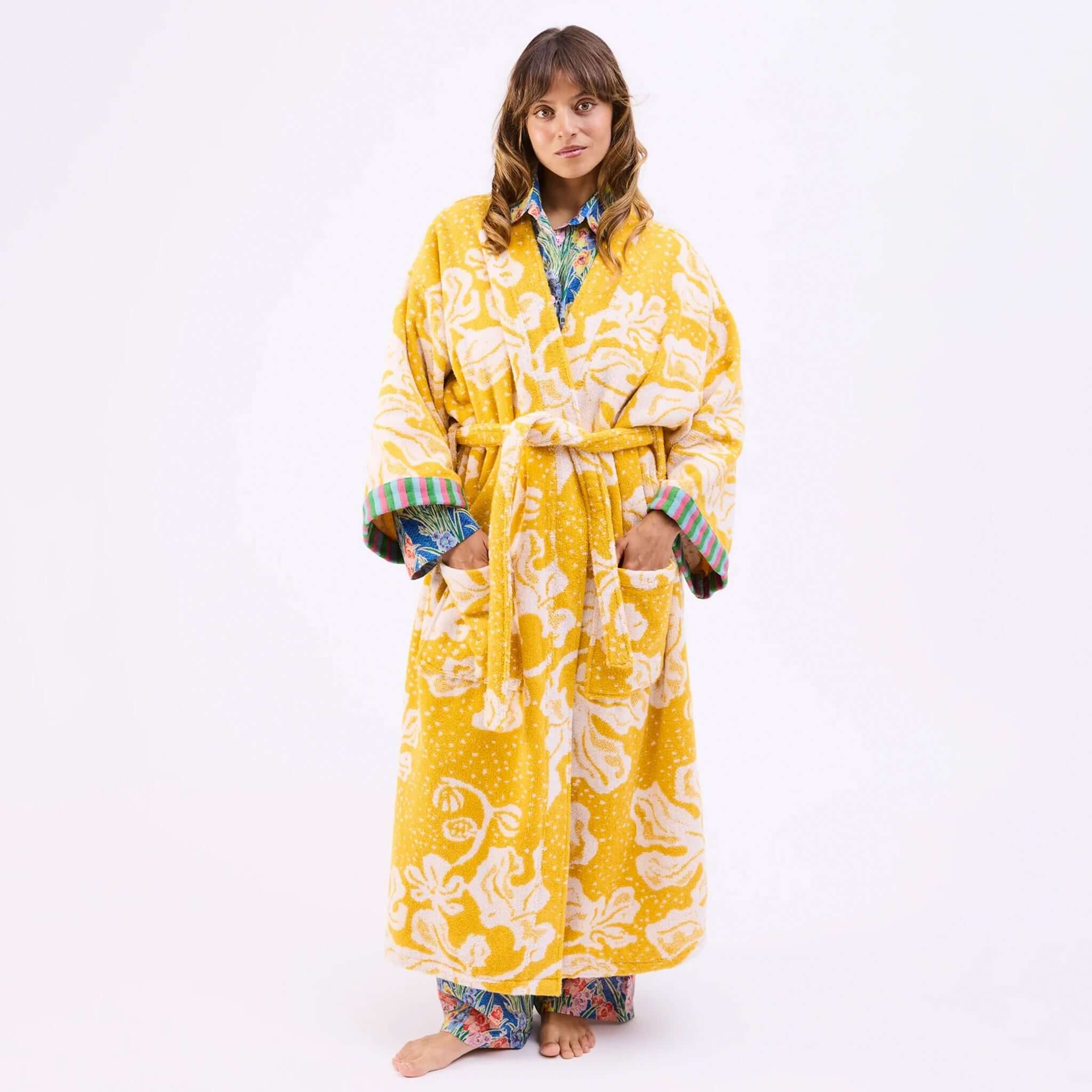 Kip & Co x Anna Spiro Elsternwig Fig Terry Bath Robe in vibrant yellow with playful patterns.