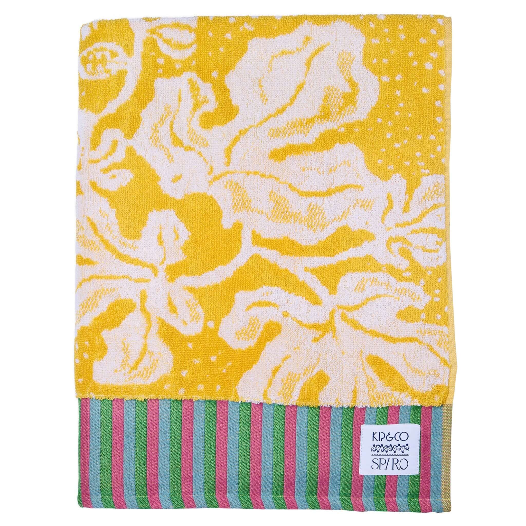 Kip & Co x Anna Spiro Elsternwig Fig Terry Bath Towel with vibrant floral design and striped edge.