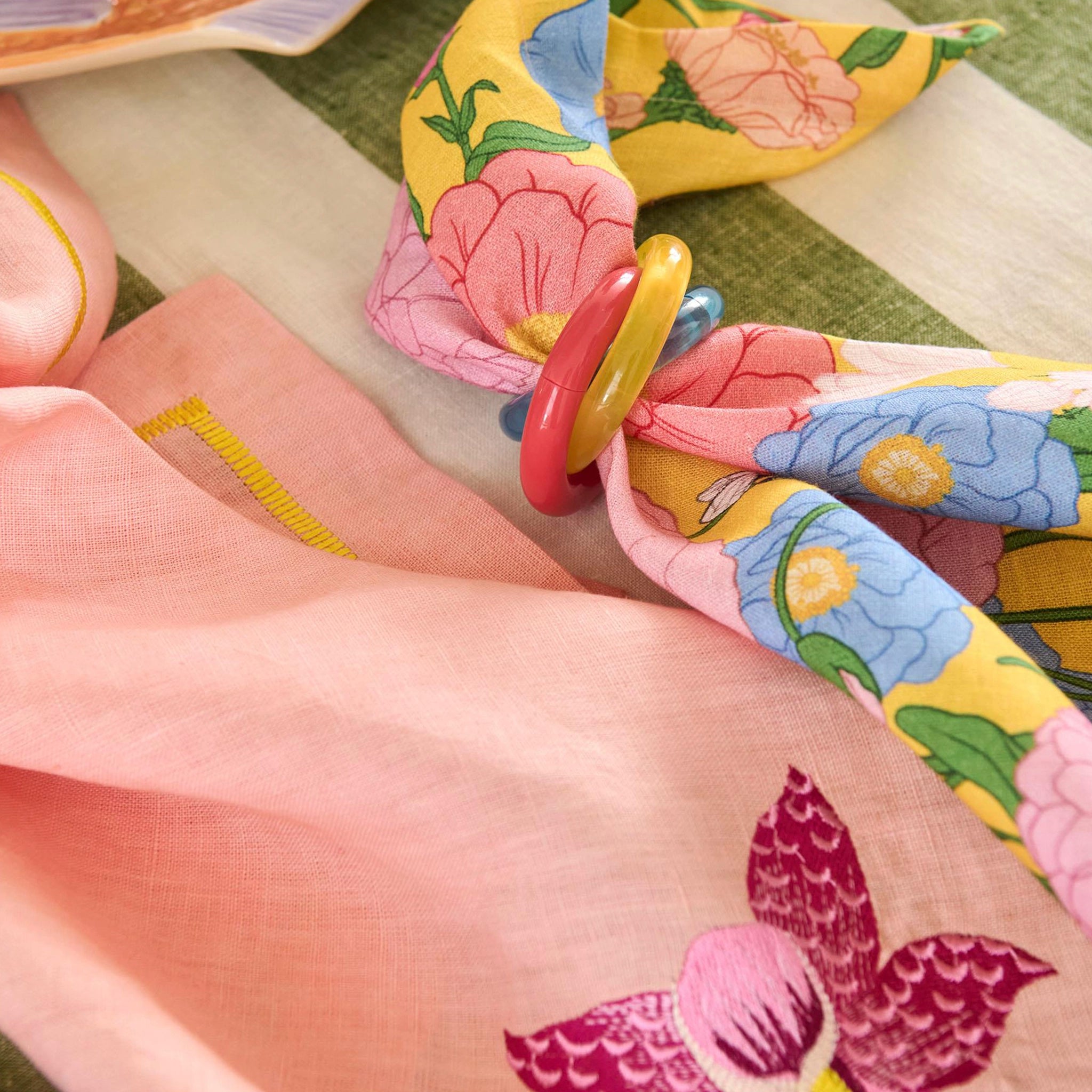 Kip & Co floral-patterned napkins on a tablecloth