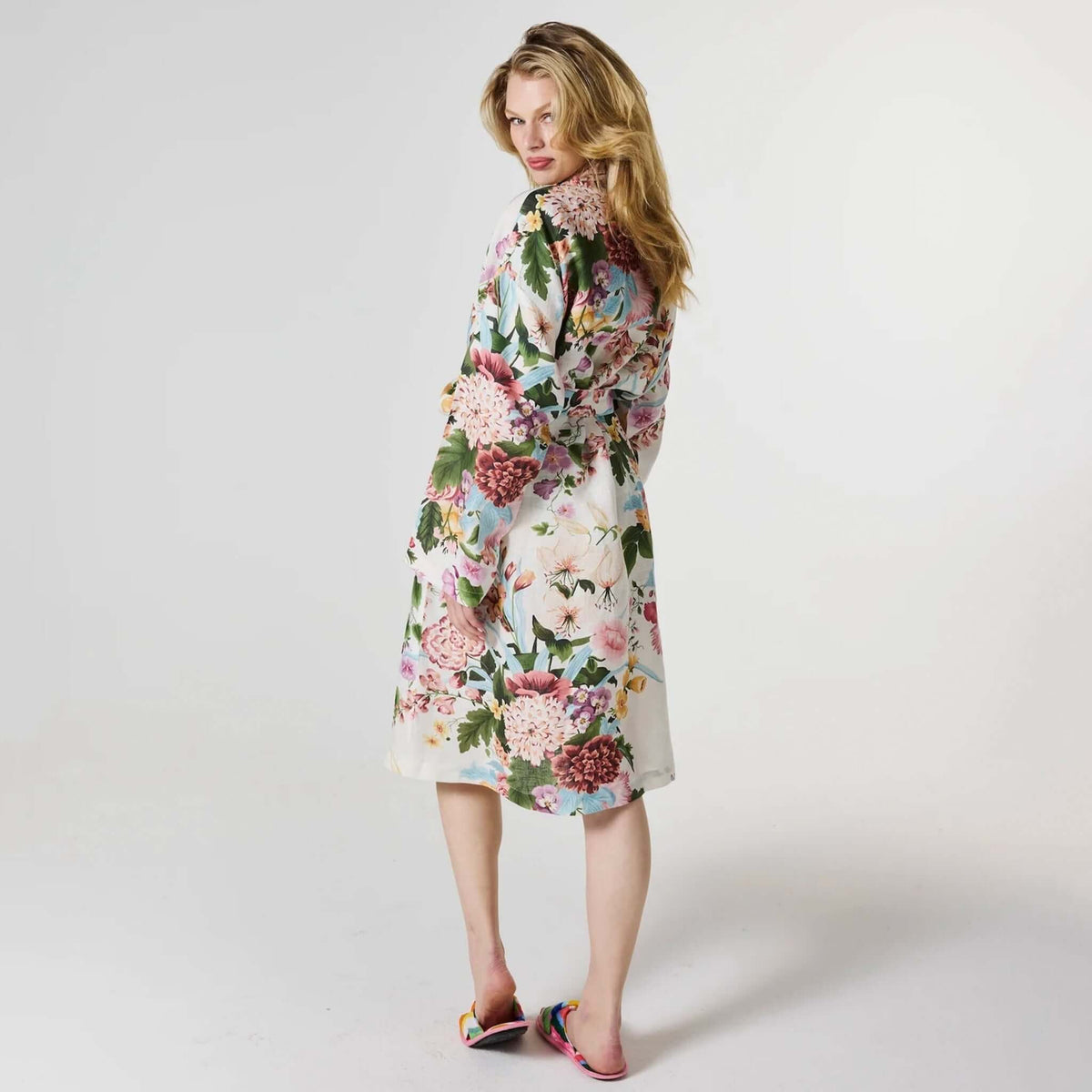 Model wearing Kip & Co Linen Robe - Belle Floral, showcasing its beautiful floral design and relaxed fit.