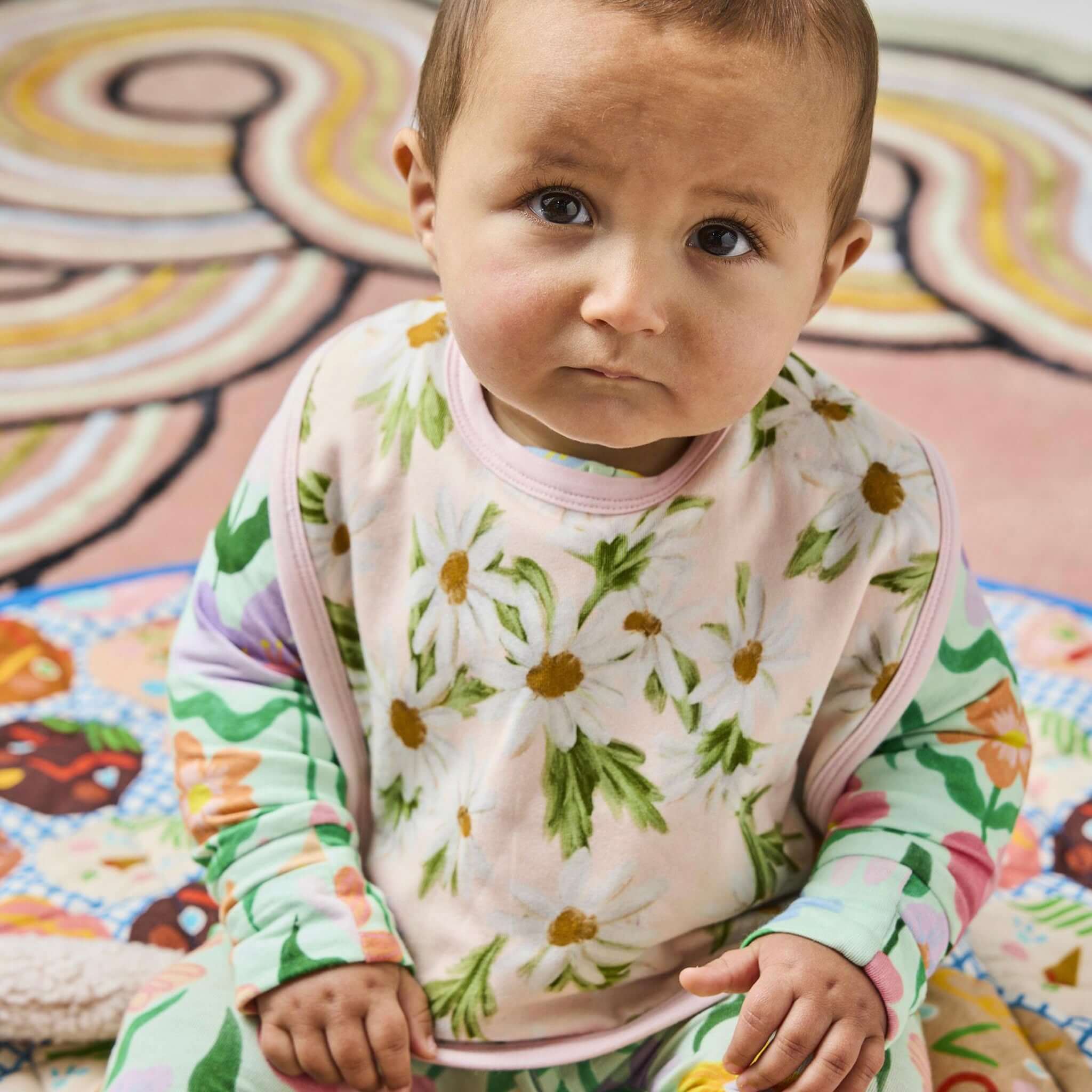 Kip & Co Organic Cotton Bib - Sweet Daisy on baby, soft organic cotton bib with daisy print, gentle and absorbent