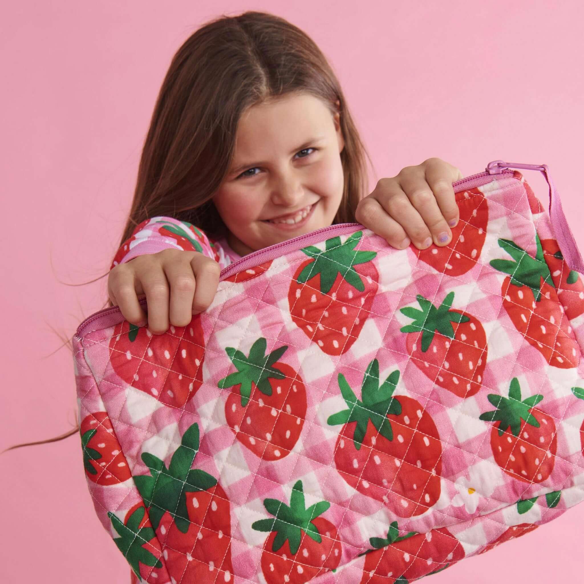 Kip & Co Quilted Toiletry Purse - Strawberry Jam quilted cotton pouch with strawberry print and pink zip
