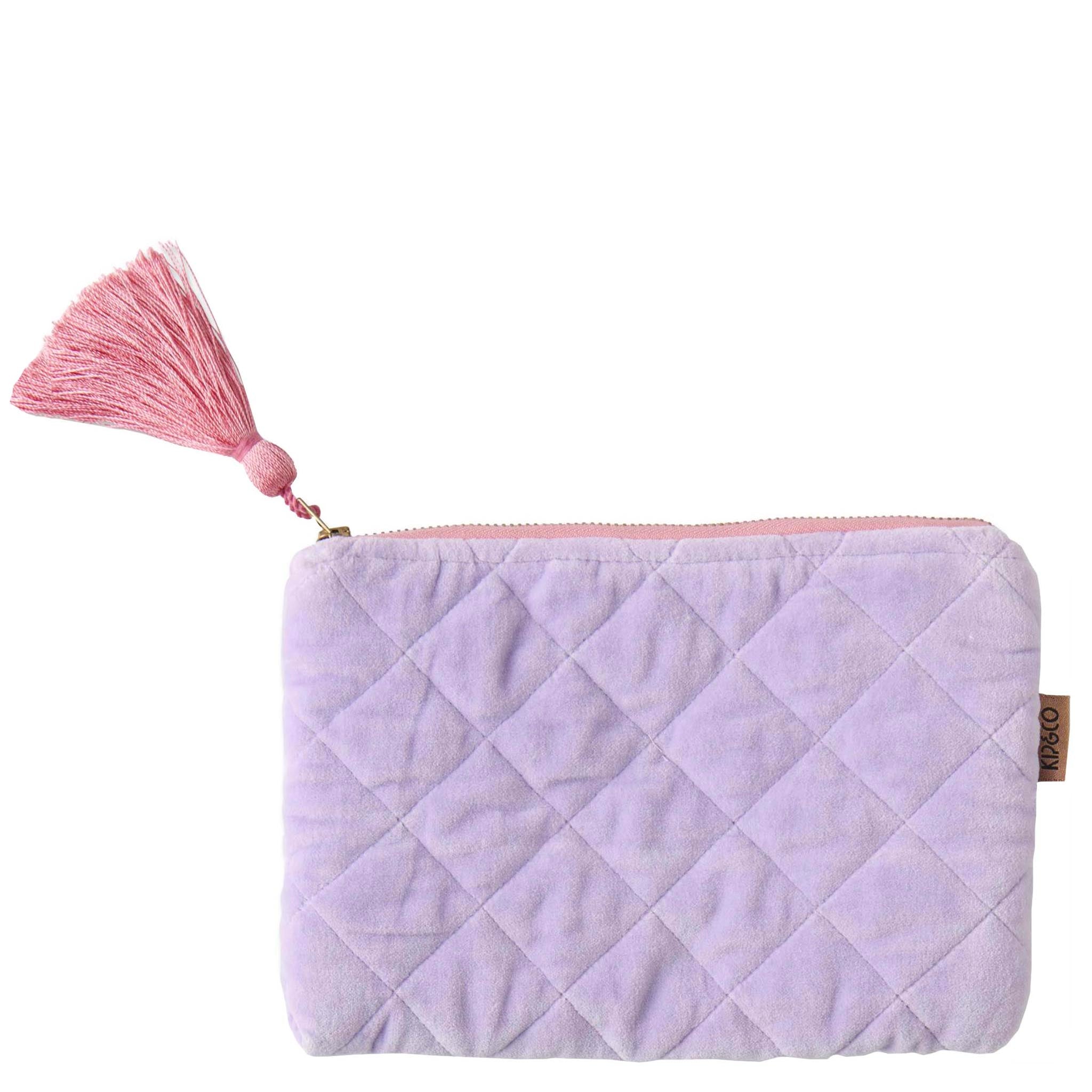 Quilted purple cosmetic bag with a pink tassel on a white background