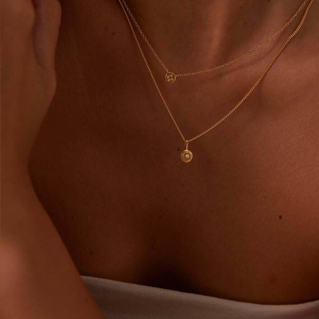 Alt Tag: Kirstin Ash Birthstone Collection Charm - April / White Topaz layered gold vermeil necklace charm on model