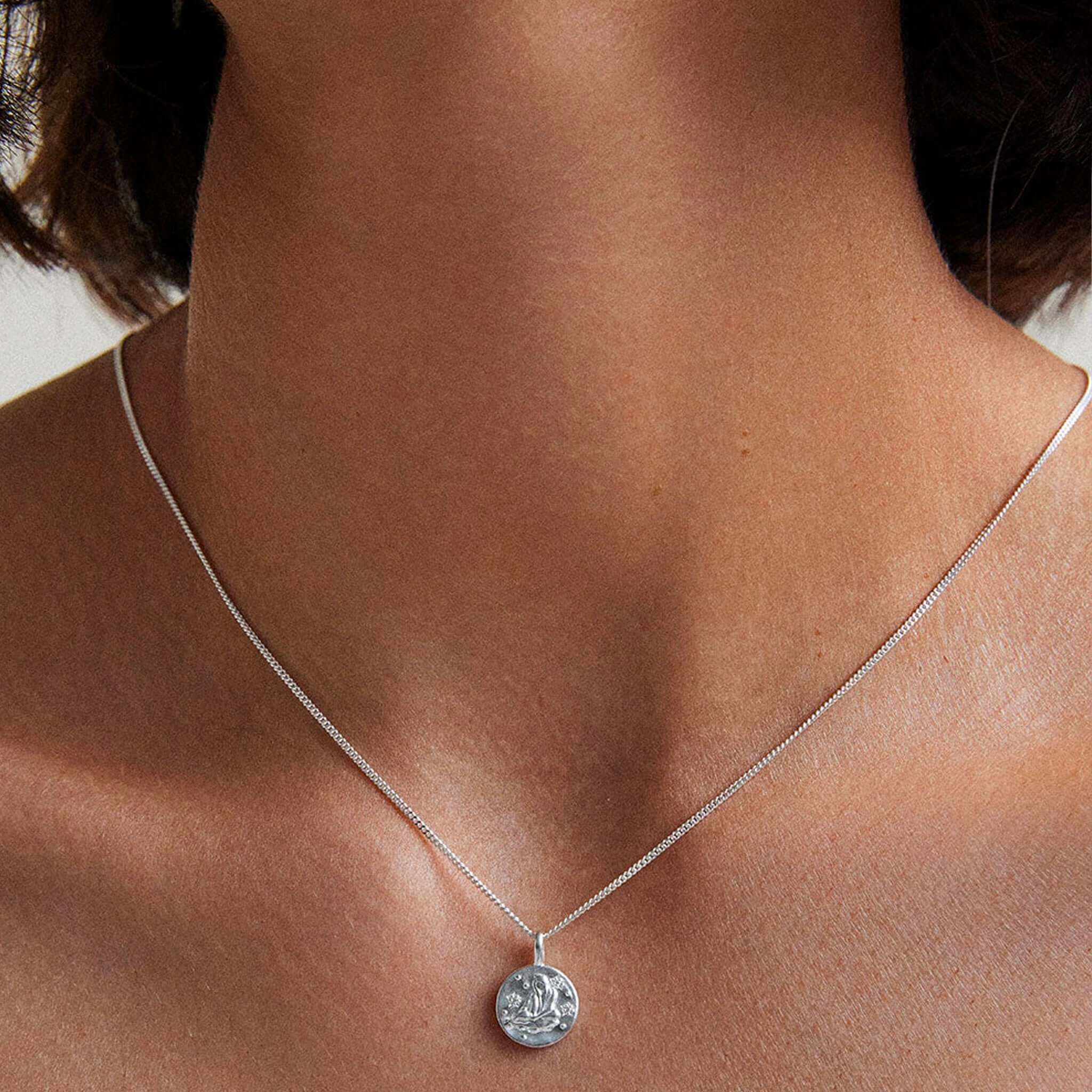 Alt Tag: Kirstin Ash Petite Zodiac Charm - Aquarius Sterling Silver necklace charm pendant on model wearing sterling silver chain