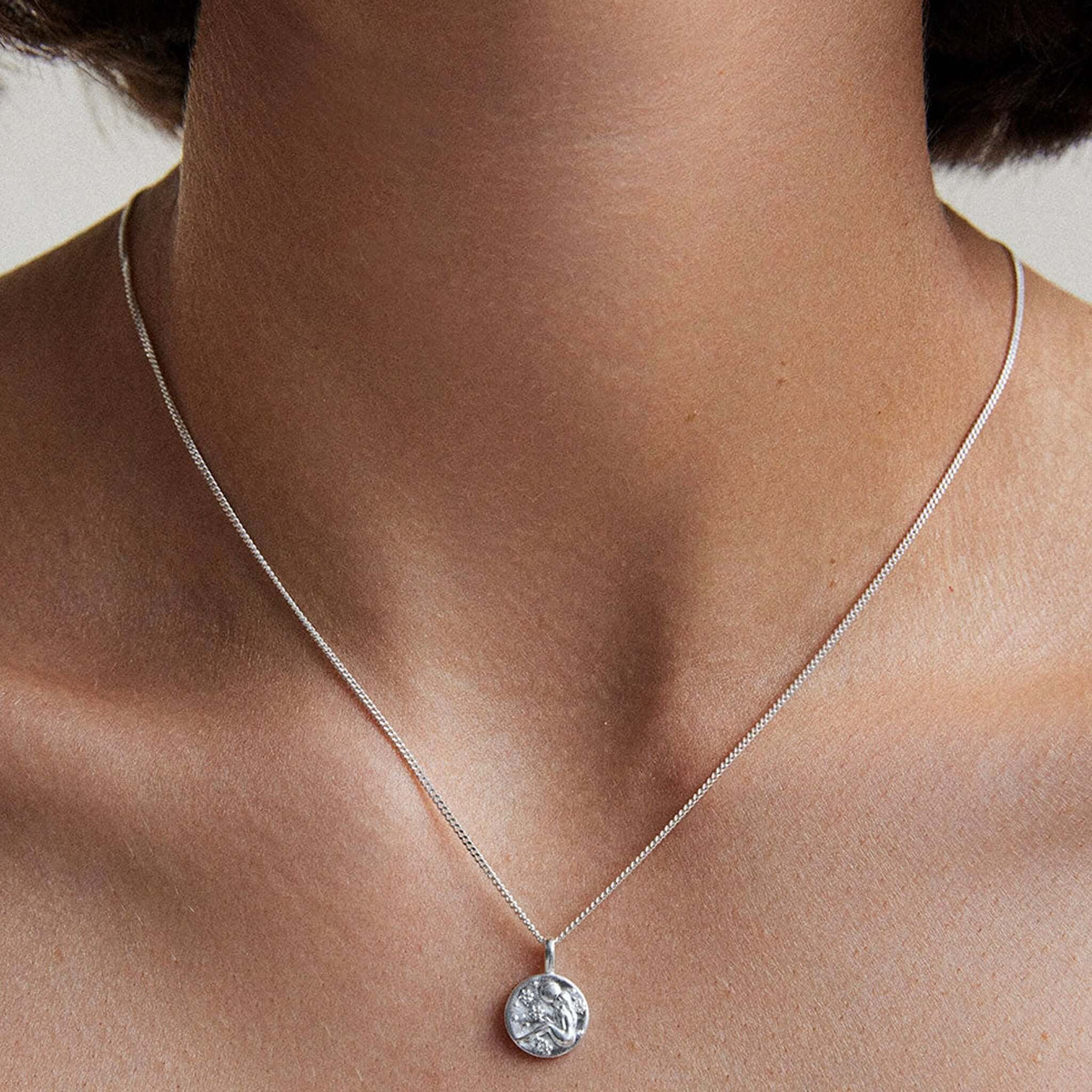 Alt Tag: Kirstin Ash Petite Zodiac Charm - Virgo Sterling Silver pendant necklace on chain, close-up worn on neck