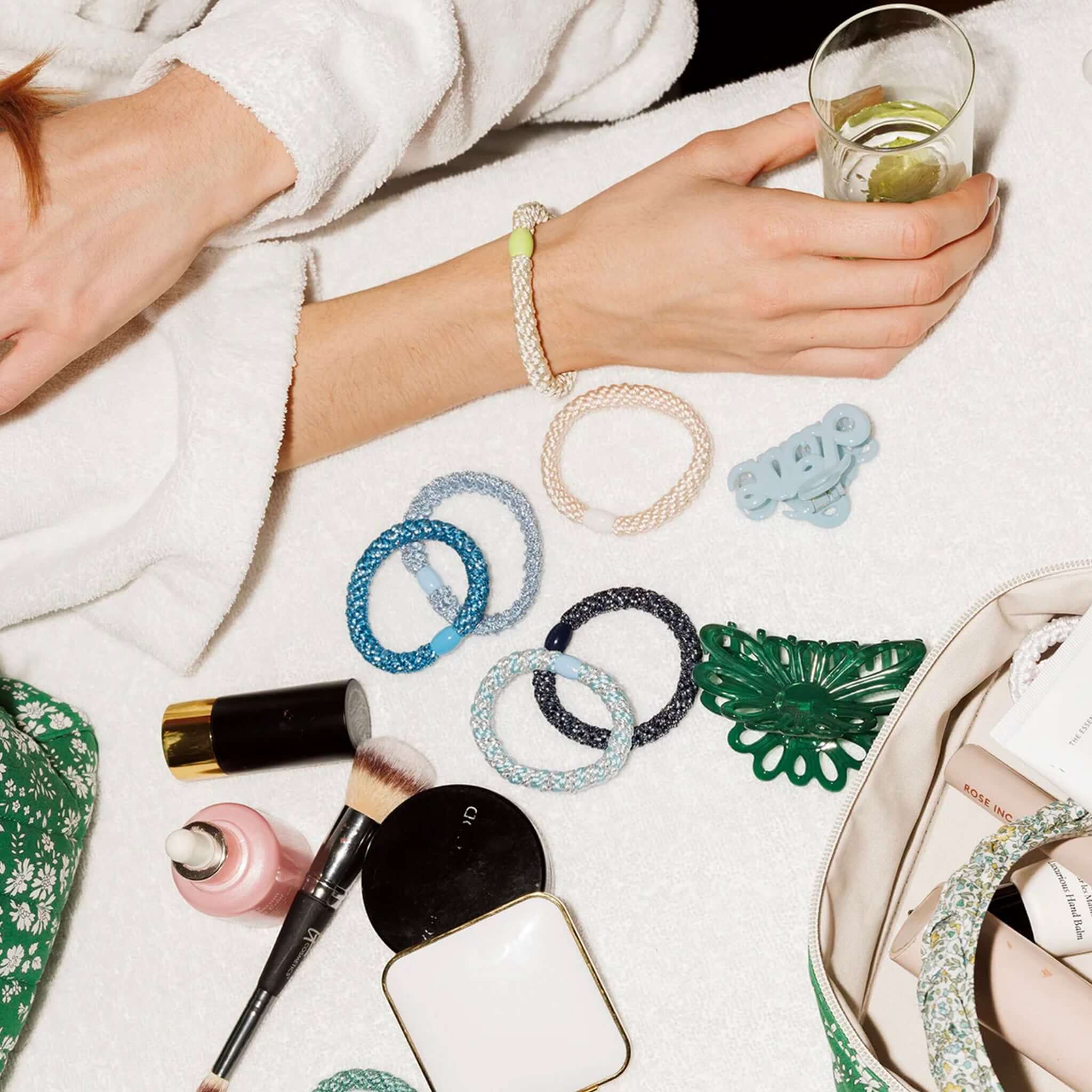 Kknekki Hair Tie - Blue Silver Glitter hair ties on towel with makeup and accessories, strong no-damage hold, waterproof, fade-resistant