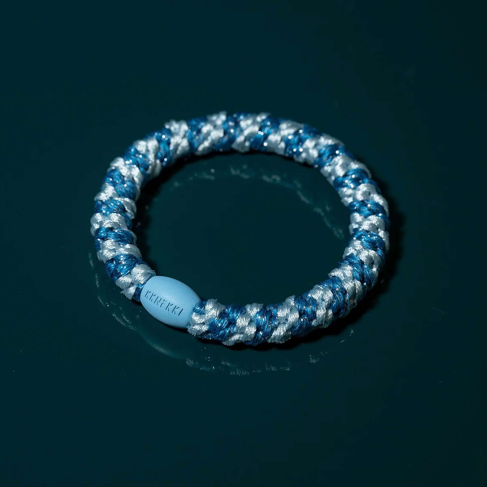 Kknekki Hair Tie - Stripe Baby Blue Glitter, a stylish and durable hair accessory with a comfortable hold.