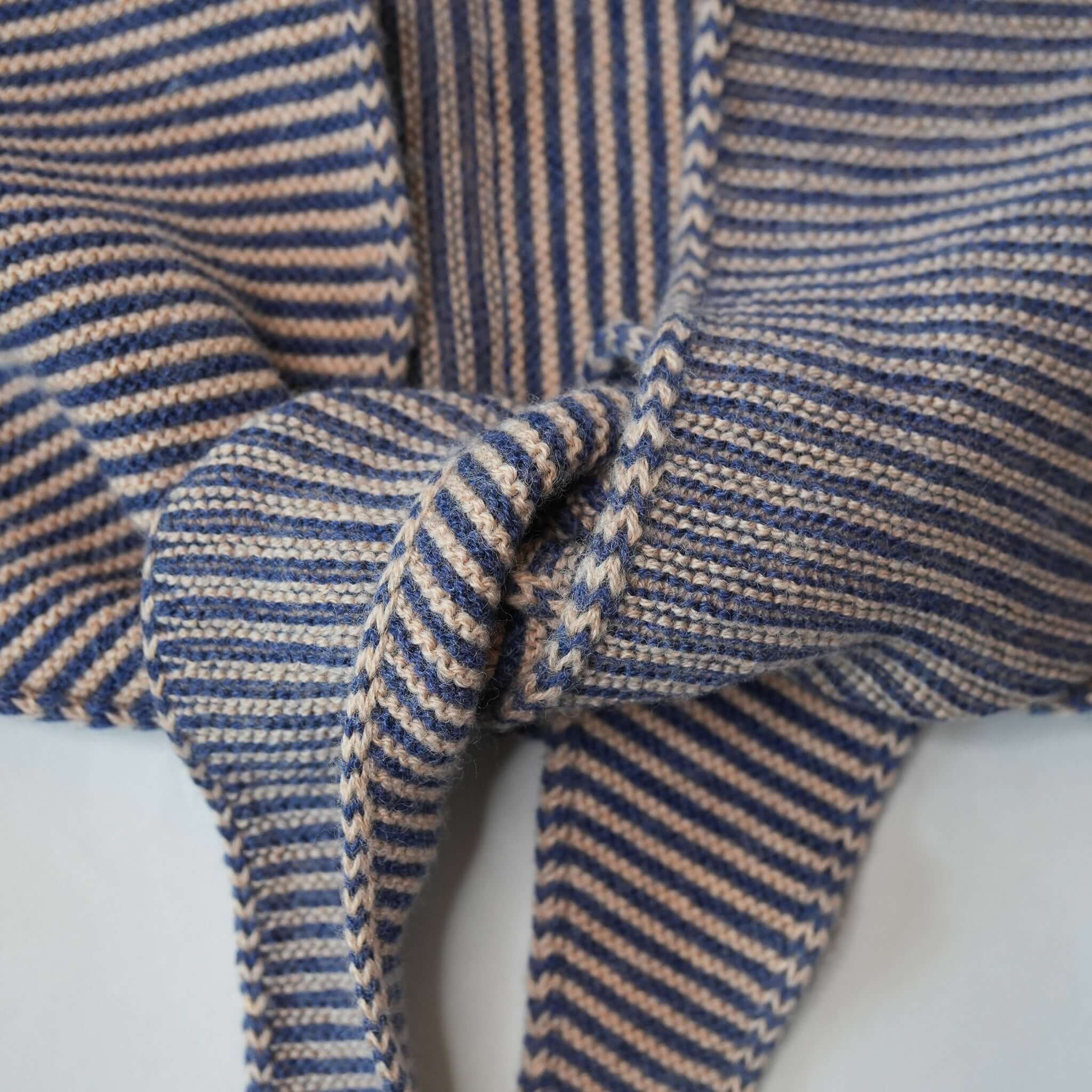 Knit Shepherd Punakaiki Merino Neckerchief - Ponga Black showing detailed woven texture and color.