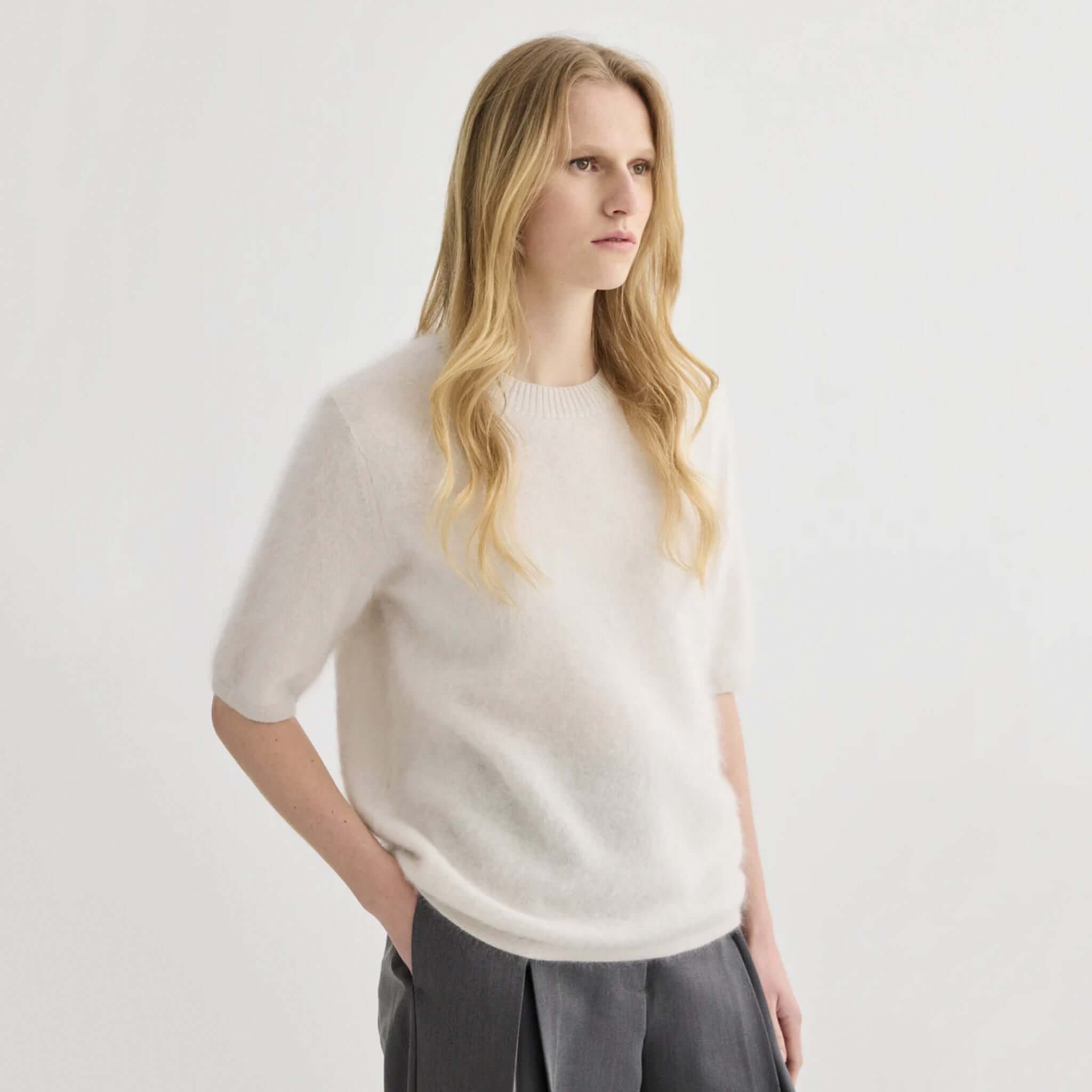 Alt Tag: Laing Brushed Cashmere T Shirt - Oyster on model, 100% Grade A brushed cashmere tee in soft oyster hue, relaxed fit