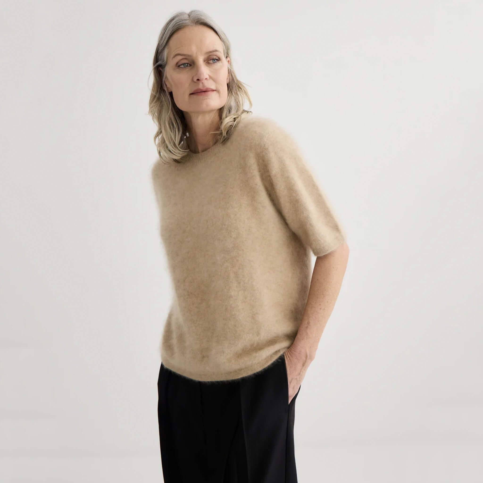 Alt Tag: Laing Brushed Cashmere T Shirt - Soft Beige brushed 100% Grade A cashmere tee, relaxed fit soft beige top styled with black trousers