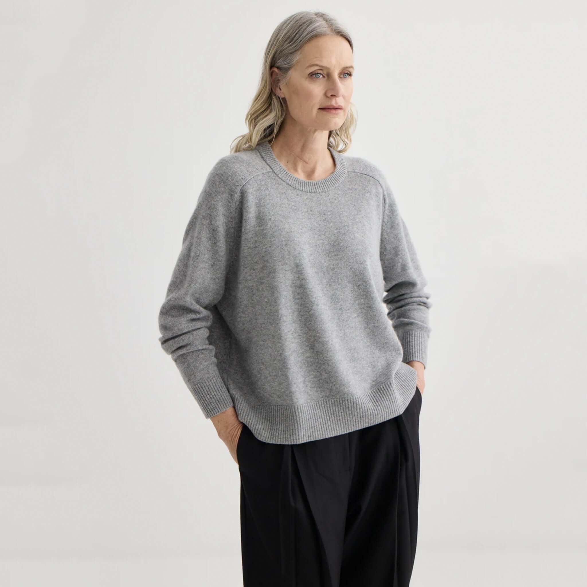 Alt Tag: Laing Cashmere Oversized Crewneck - Grey Marle worn by model, relaxed oversized 100% cashmere crewneck sweater with ribbed trims