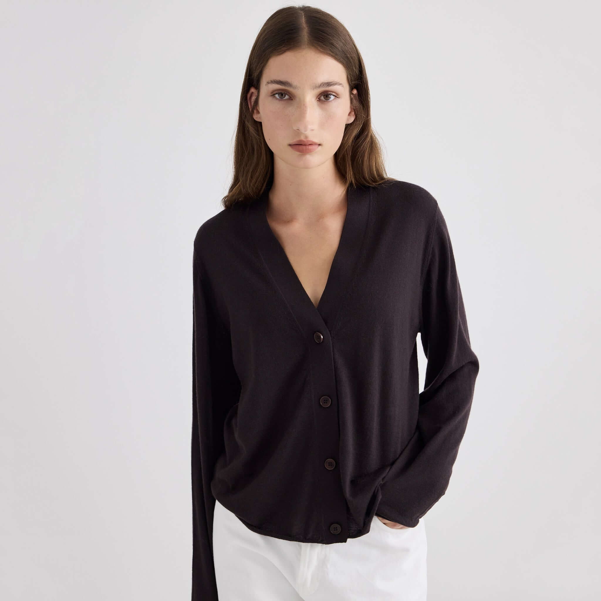 Laing Liv V-Neck Merino Cardigan - Chocolate displayed on a model, showcasing its elegant and relaxed fit.