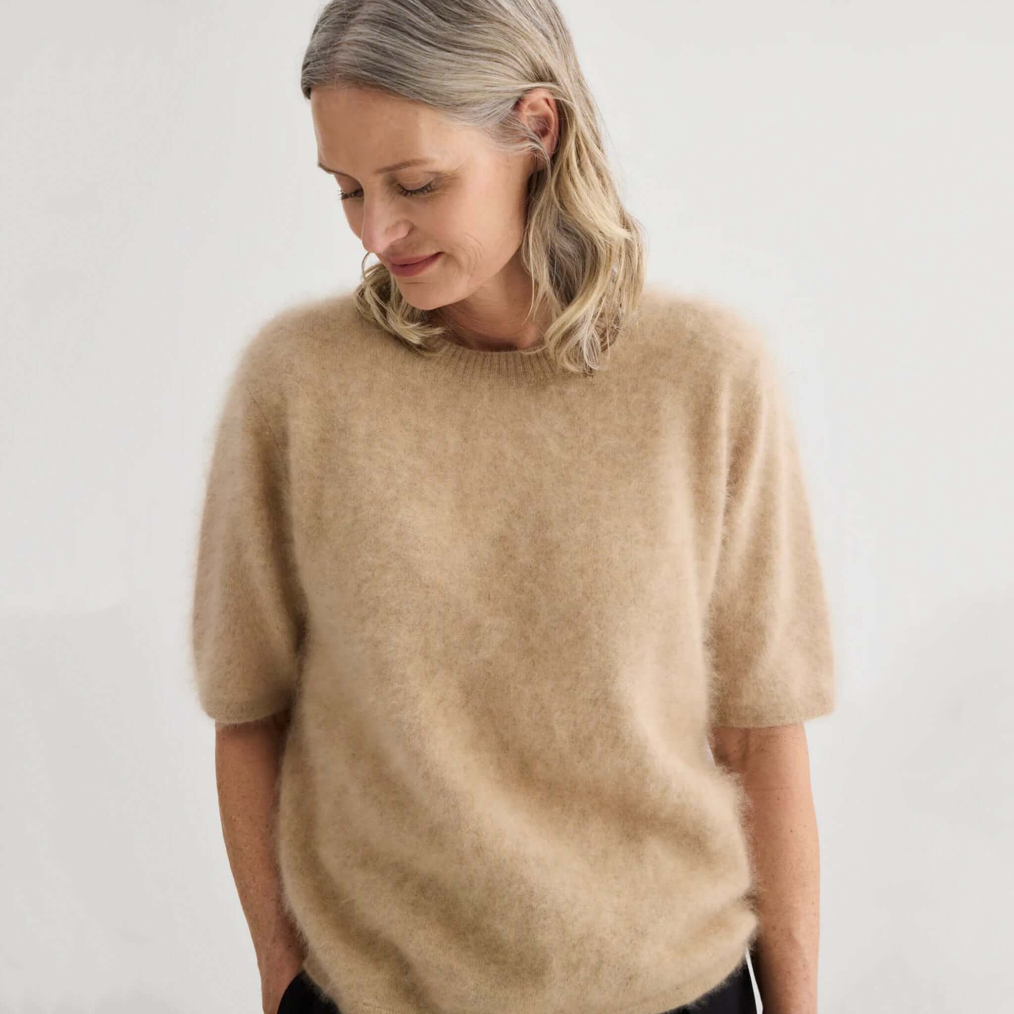 Alt Tag: Laing Brushed Cashmere T Shirt - Soft Beige worn by model, brushed 100% cashmere tee with relaxed fit in warm beige tone
