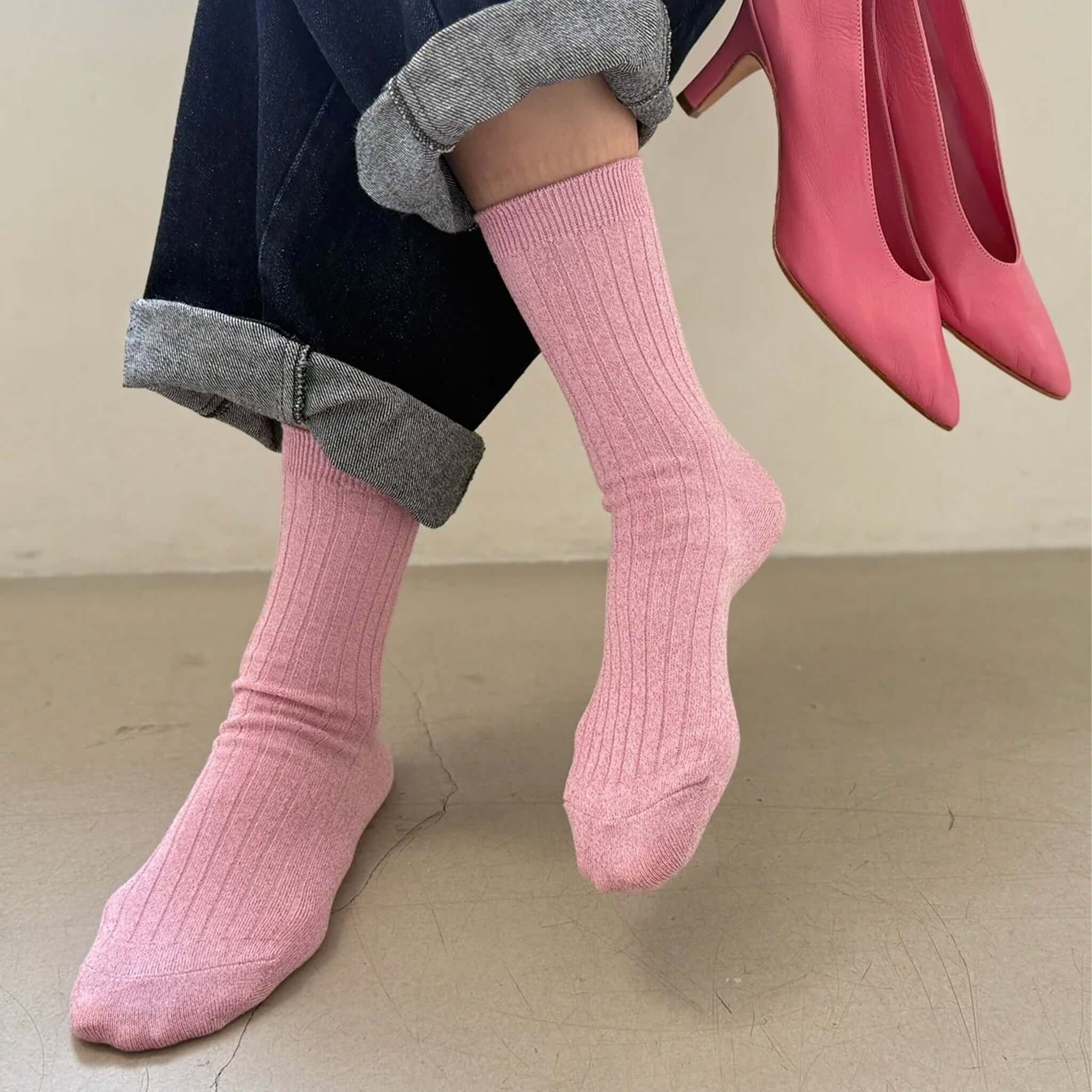 Alt Tag: Le Bon Shoppe Her Lurex Socks - Sparkling Rosé glittery ribbed quarter-crew pink socks styled with cuffed jeans and heels
