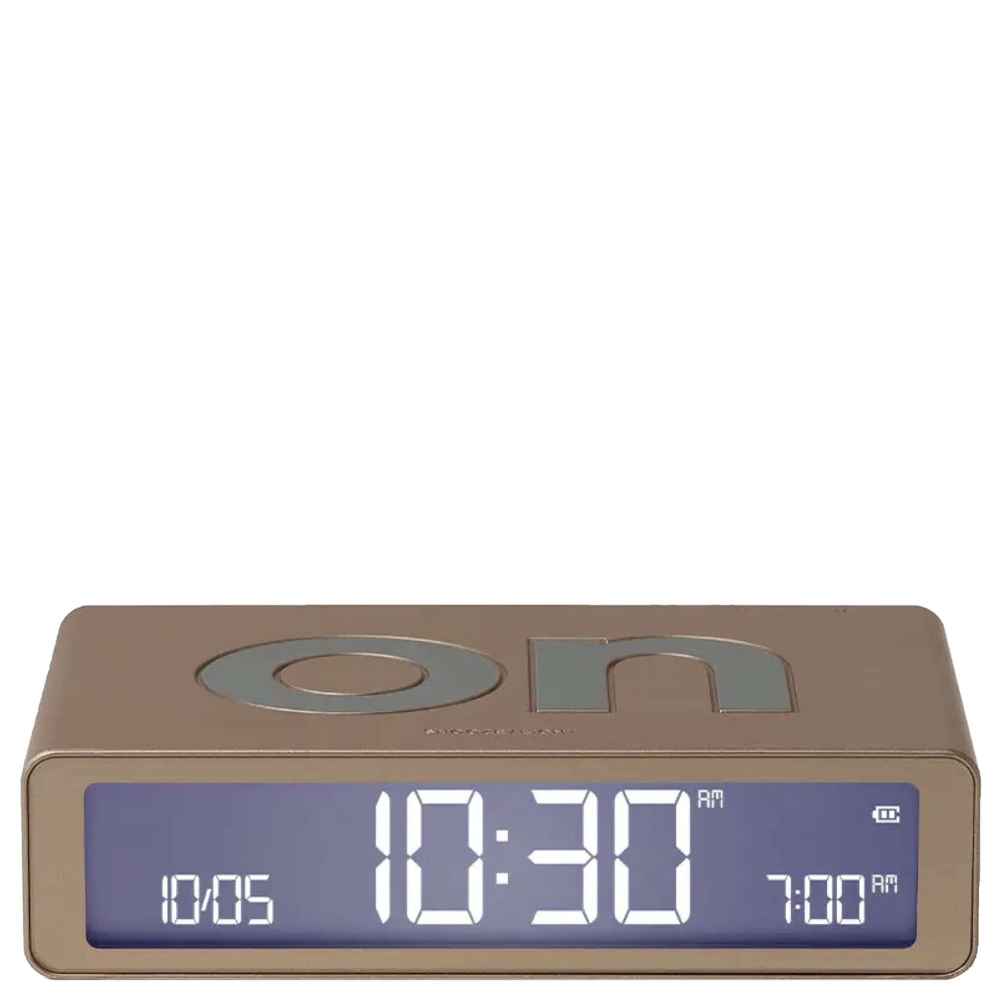A reversible Lexon Flip Classic alarm clock with a soft gold finish, displaying the time 10:30 on its LCD screen.