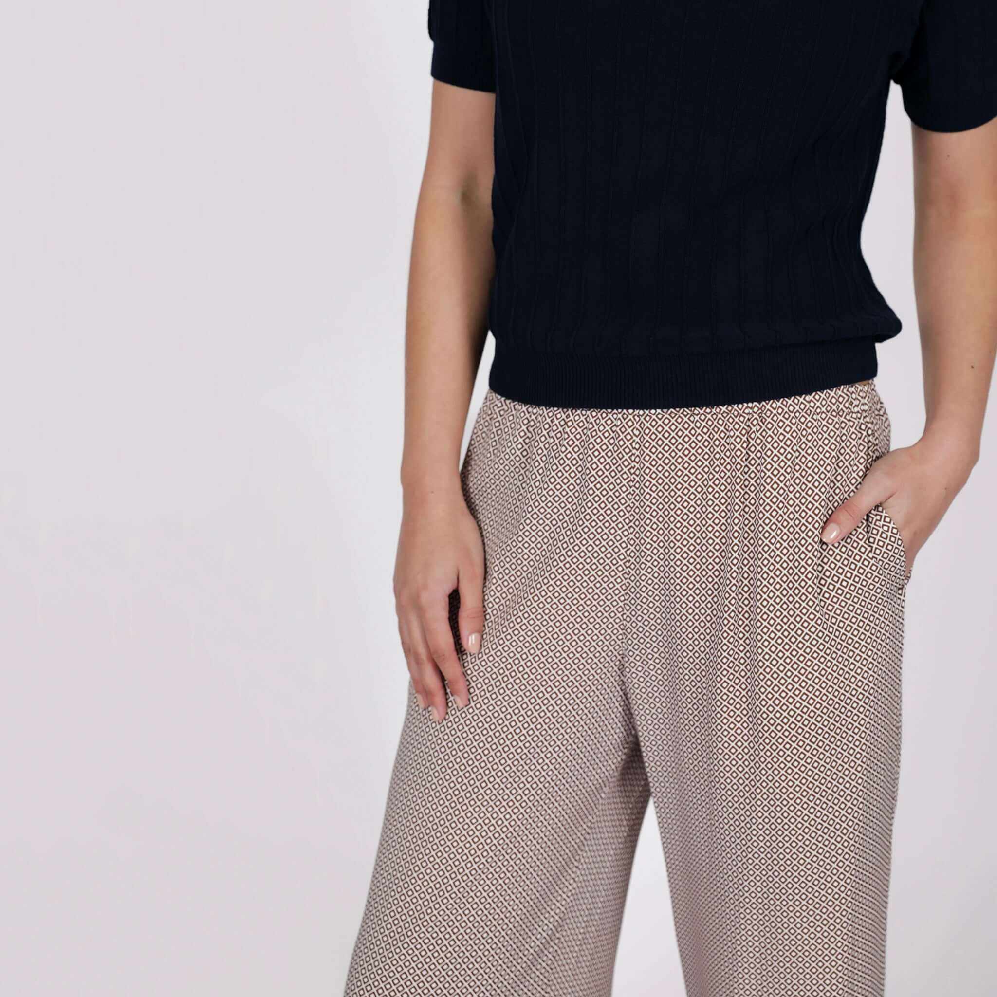 Marlow Eclipse Wide Leg Pants - Prism worn with a navy top, showcasing effortless style and side pockets.