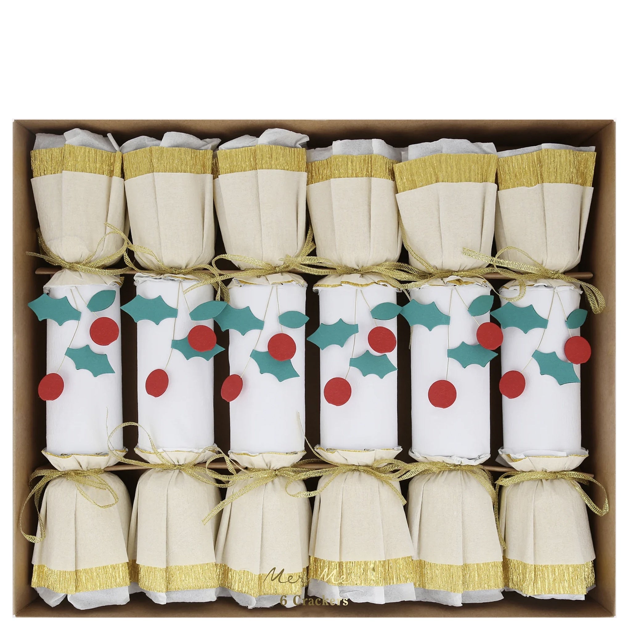 A set of six Christmas crackers with gold ribbon bows, white crepe paper layers, and red and green holly leaves and berries, presented in a box.