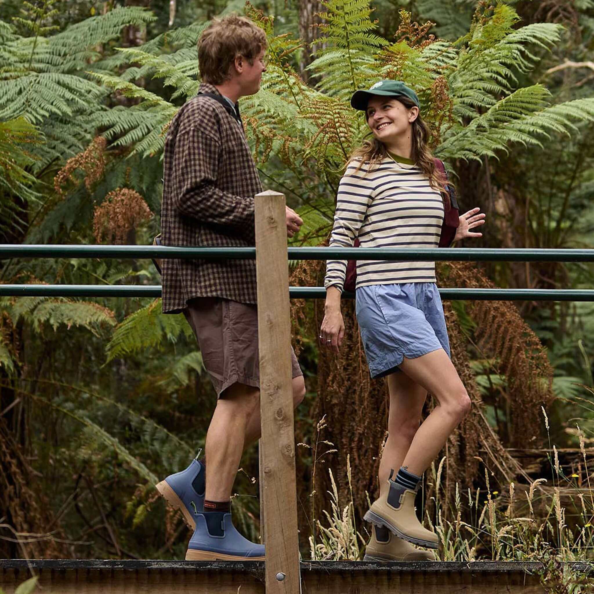 Merry People Oberon Boots - Storm Blue worn on forest boardwalk walk, 100% waterproof natural rubber unisex wide-fit boots