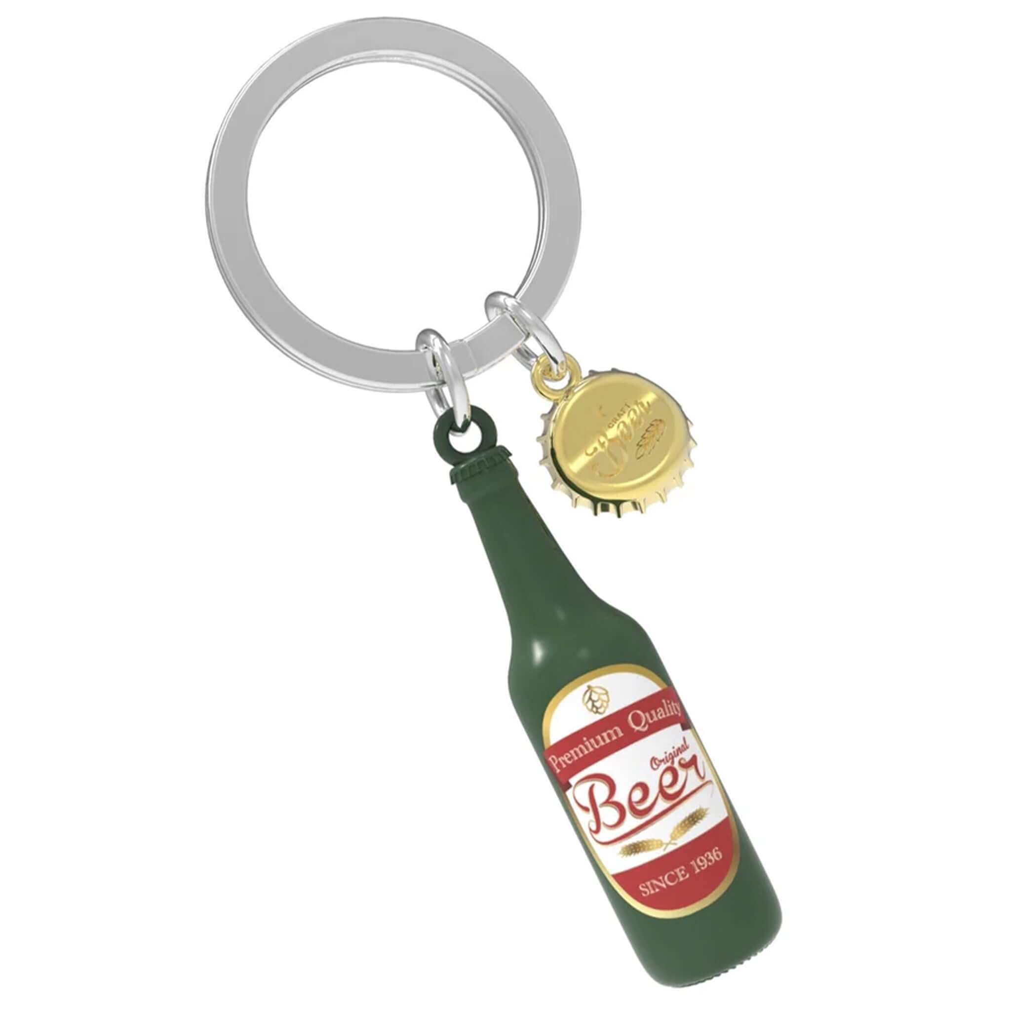 A 3D keyring resembling a beer bottle with a green label, red text, and a gold-colored cap.