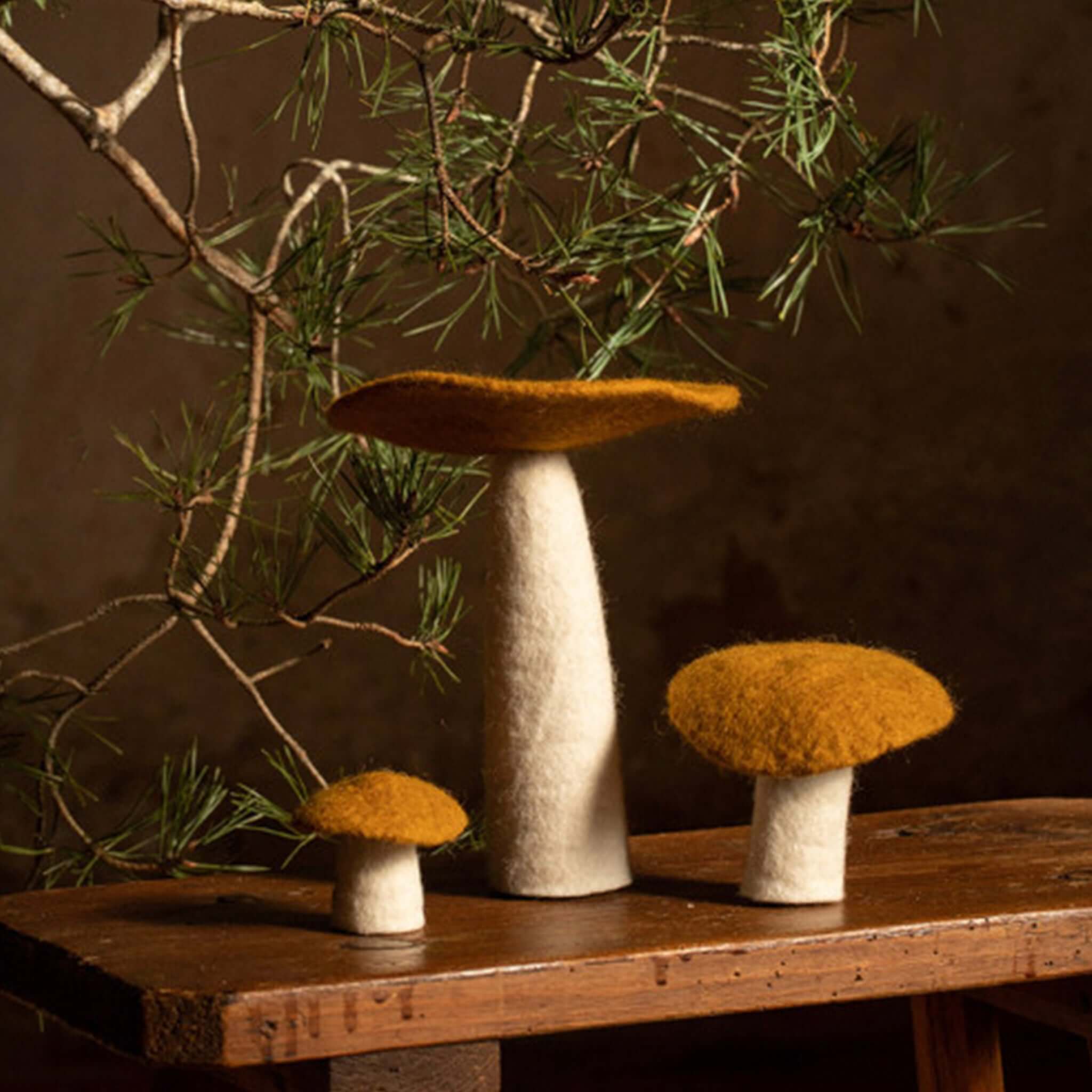 Alt Tag: Muskhane Felt Mushroom - Large Gold handmade felt mushroom decor, gold cap, fairtrade Nepal, 11cm high