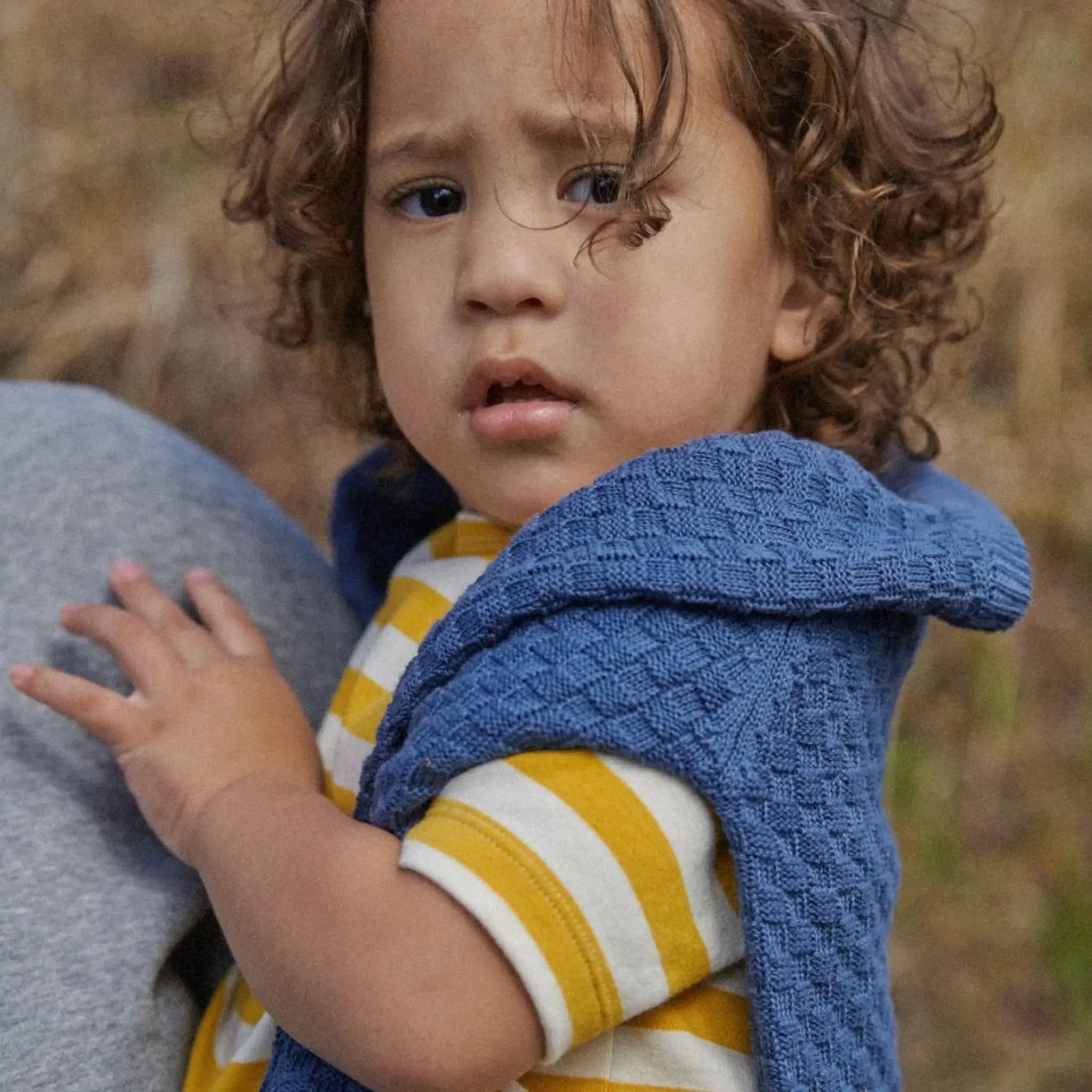 Alt Tag: Nature Baby Organic Cotton Basket Knit Billy Jumper - Vintage Indigo on toddler, chunky knit organic cotton layer in vintage indigo