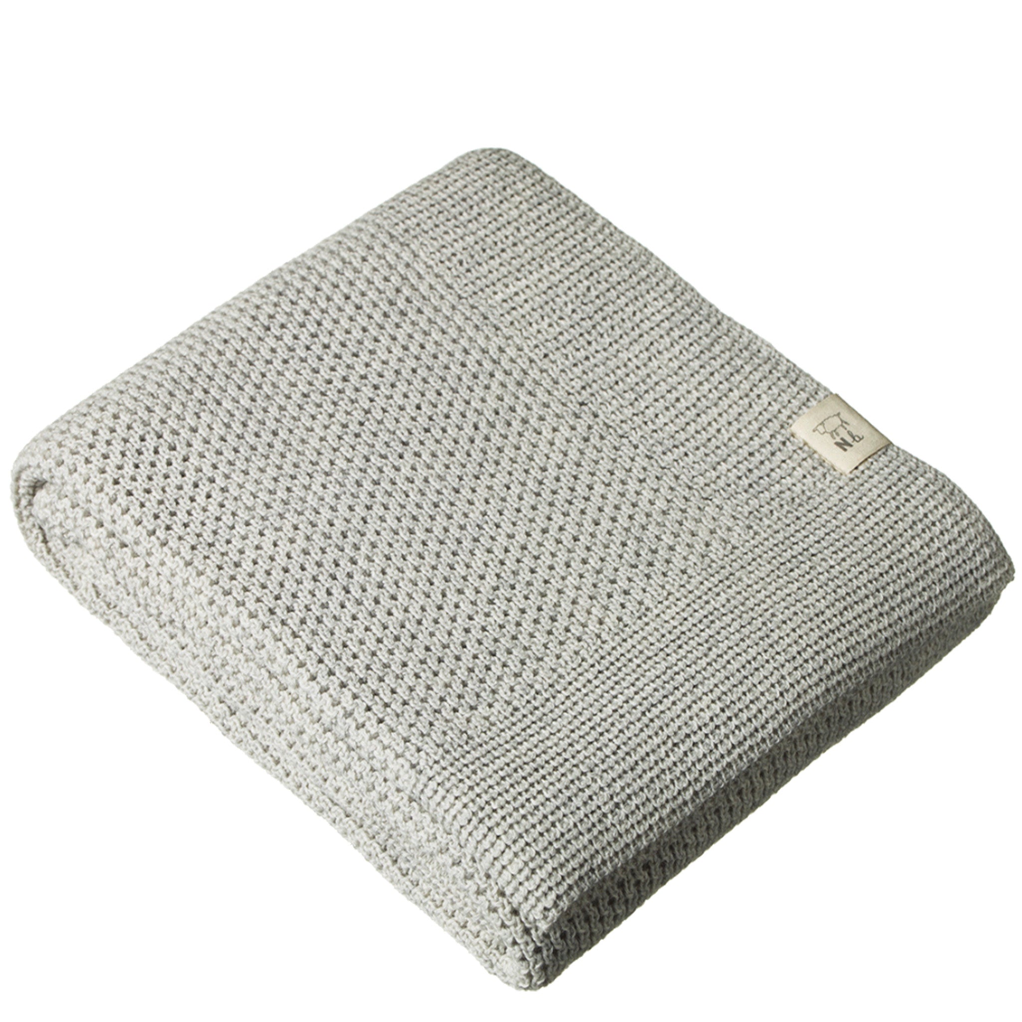 Folded organic merino wool blanket in light grey marle with a visible knitted texture.