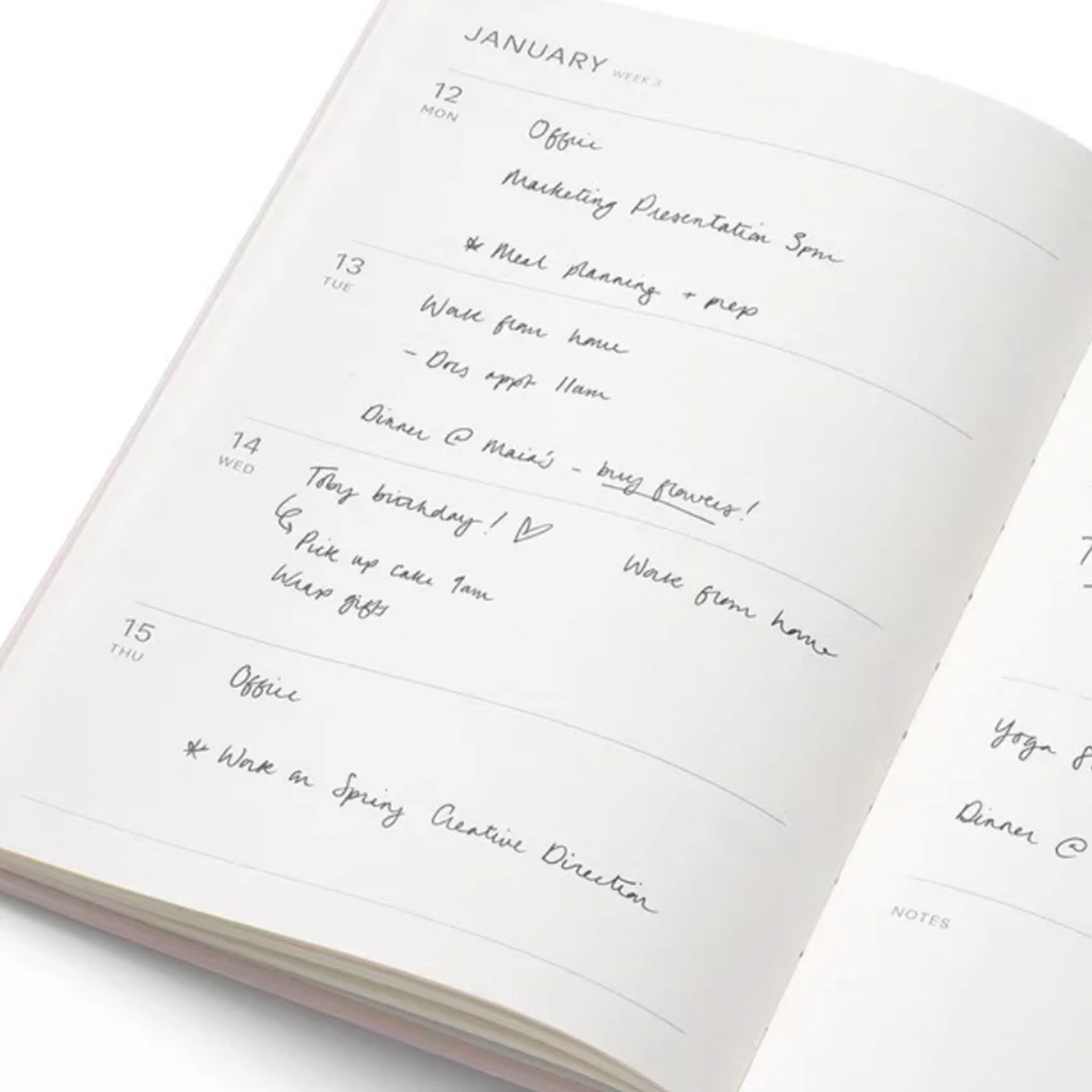 Open planner showing a page with handwritten notes and tasks for January.