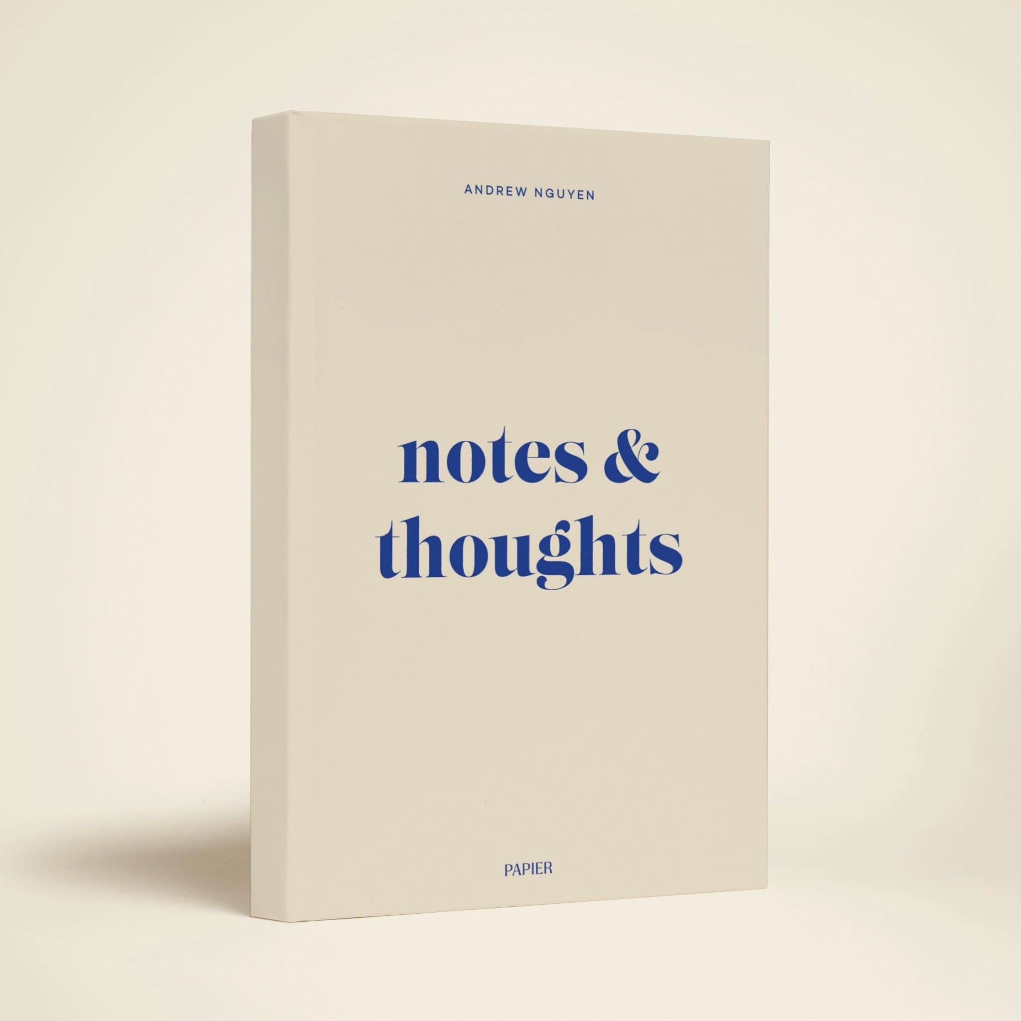 Book titled 'notes & thoughts' by Andrew Nguyen on a beige background