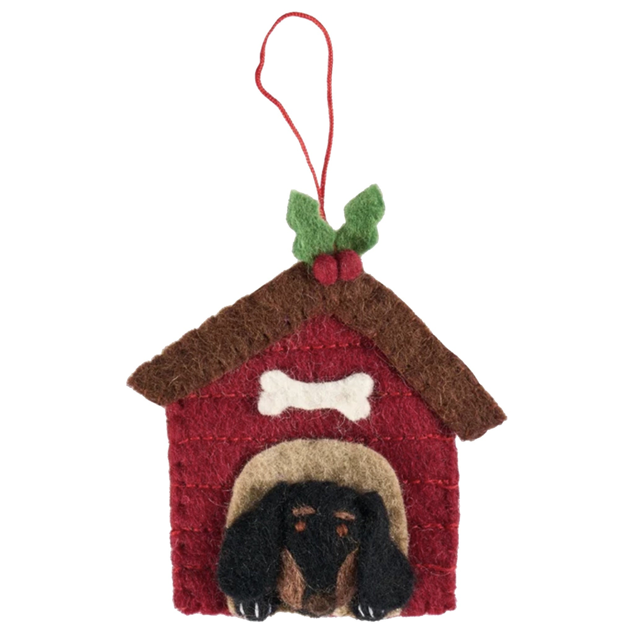 Decorative ornament of a doghouse with a dog inside on a white background