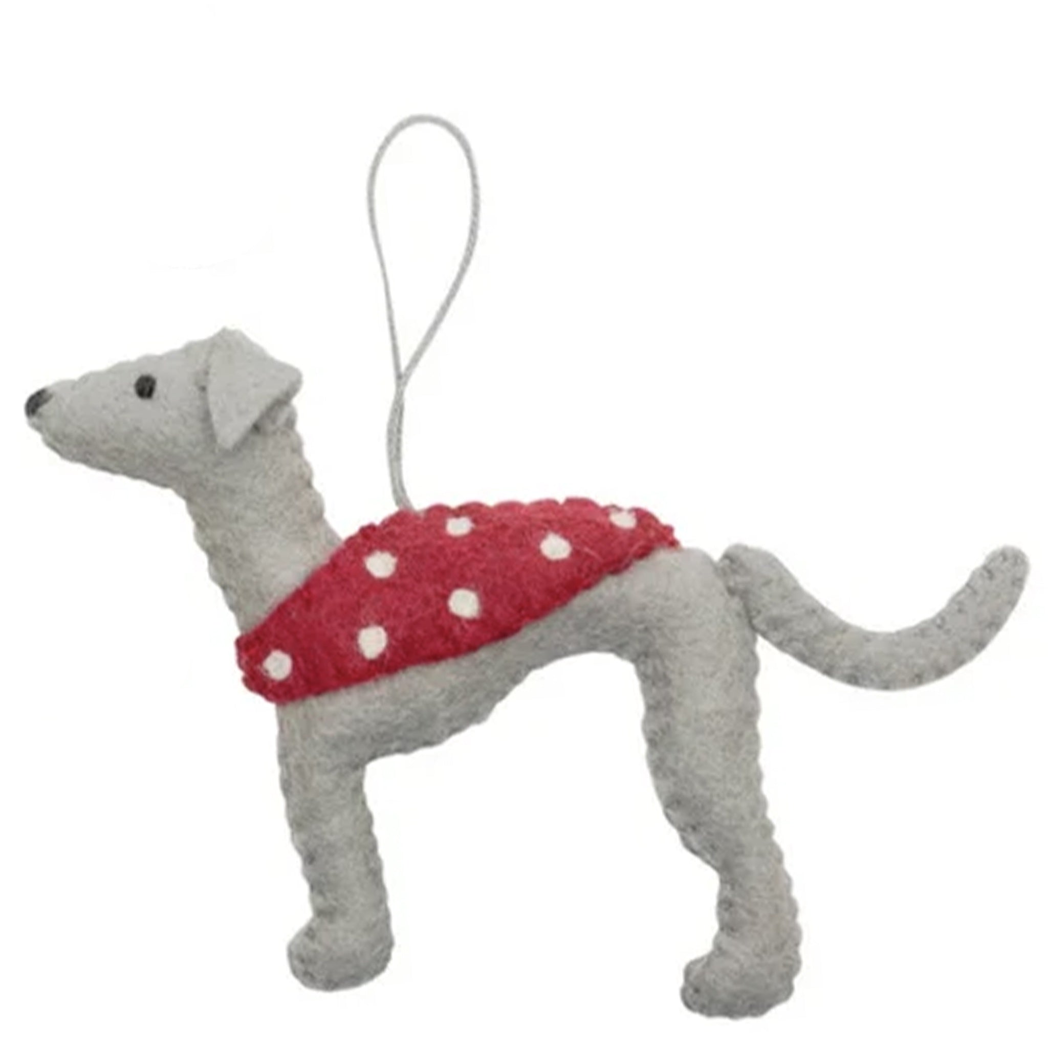 Gray dog-shaped ornament with a red sweater on a white background
