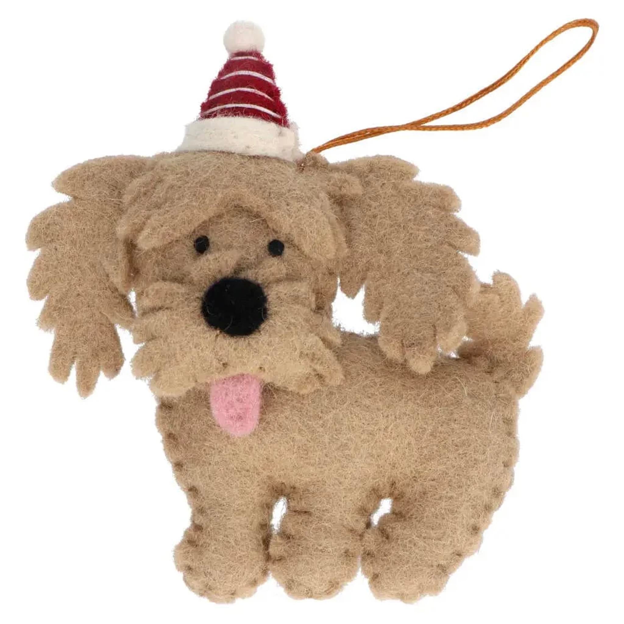 Plush dog toy with a Santa hat on a white background