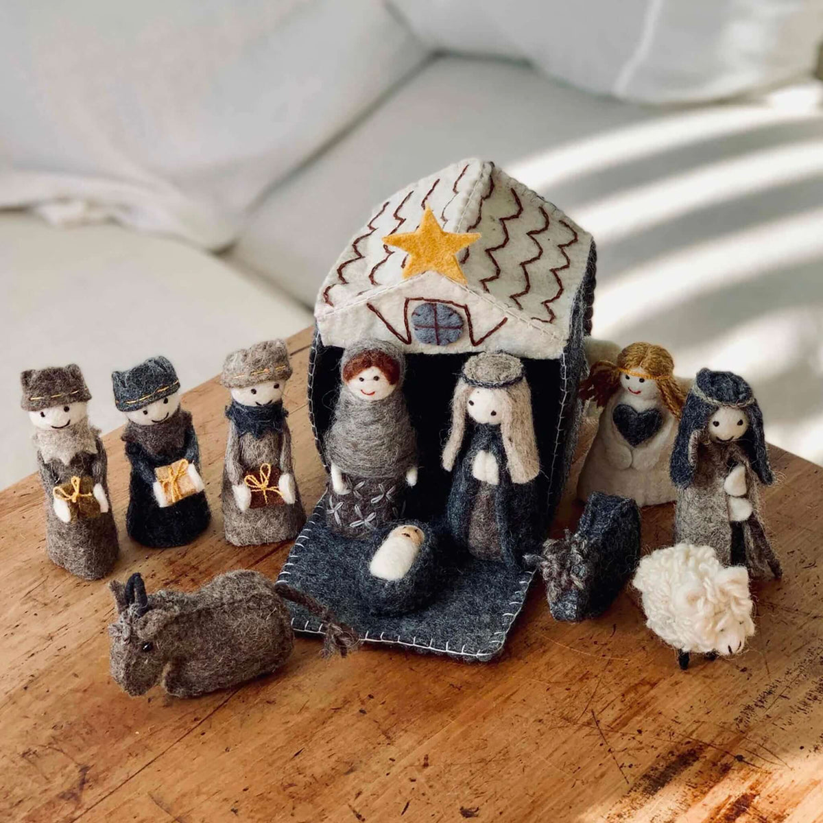 Alt Tag: Pashom Nepal Felt Christmas Nativity Set - Monotone handmade felt figurines with stable, Mary, Joseph, baby Jesus, wise men, angel