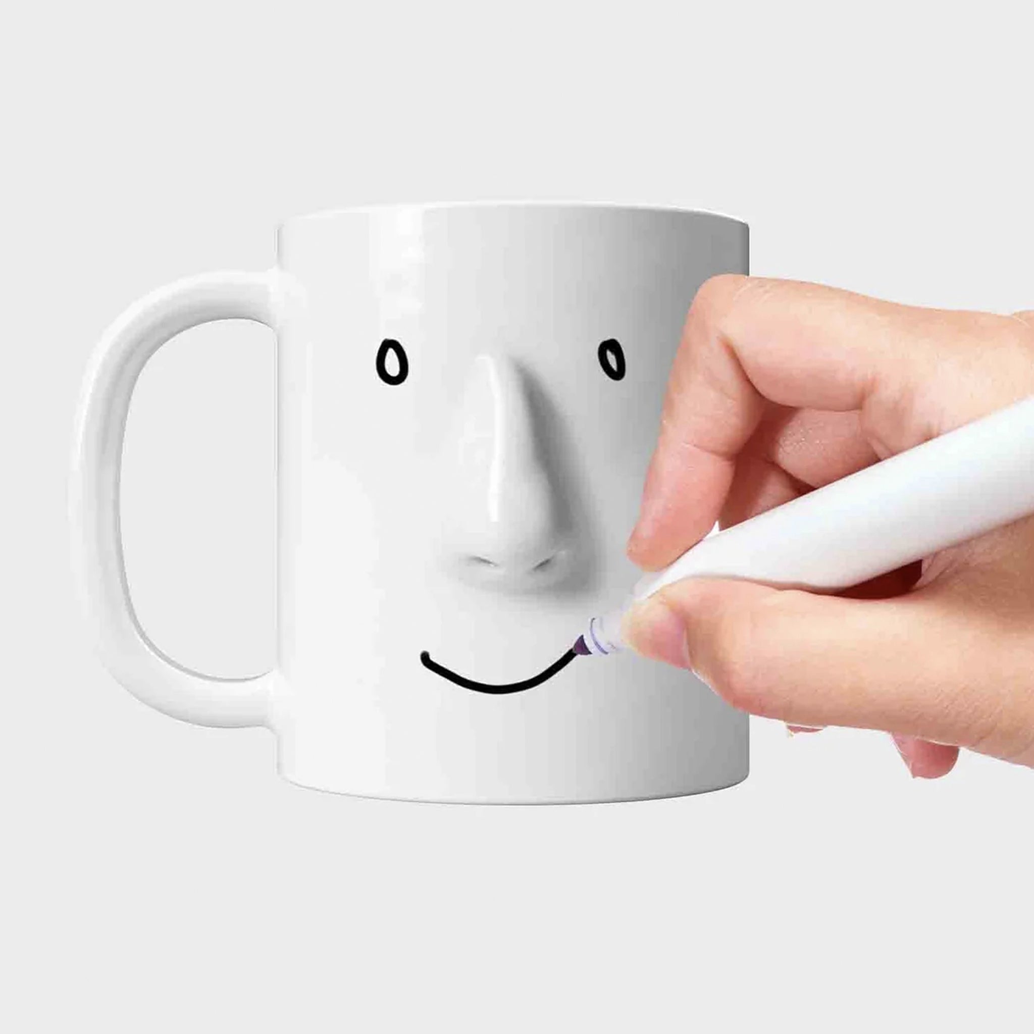 White Ceramic mug that you can draw a face on to show others your mood.