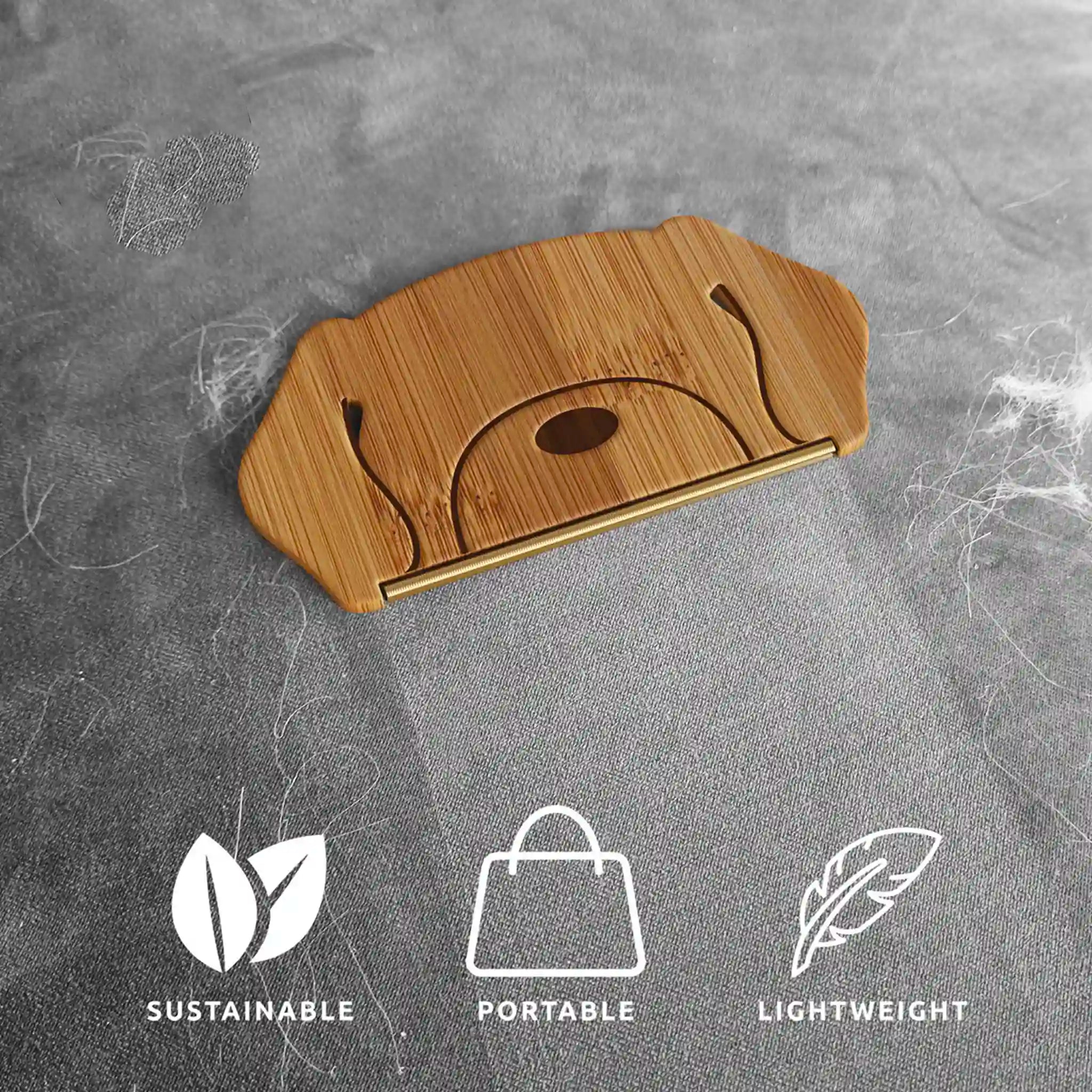 Wooden cutting board with a gold accent on a gray surface, featuring icons and text about sustainability, portability, and lightness.