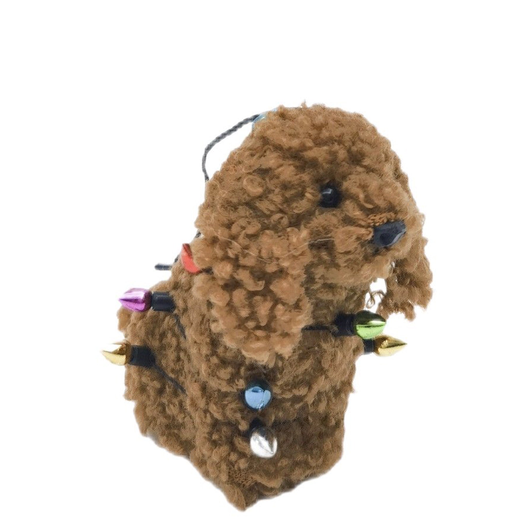 Brown plush toy resembling a dog with colorful lights on a white background