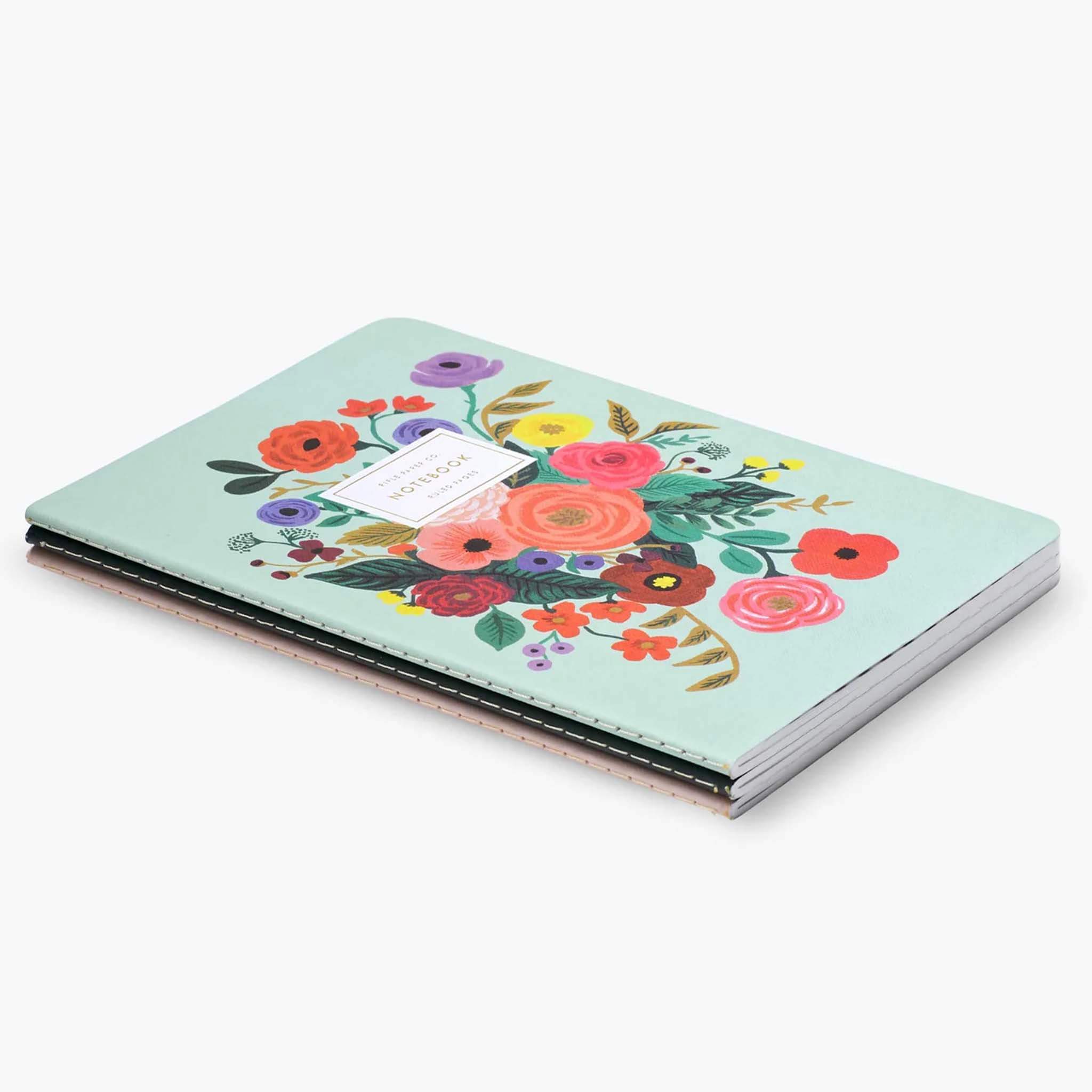 Rifle Paper Stitched Notebook Set - Garden Party featuring a mint notebook with colorful floral illustration and gold foil accents.