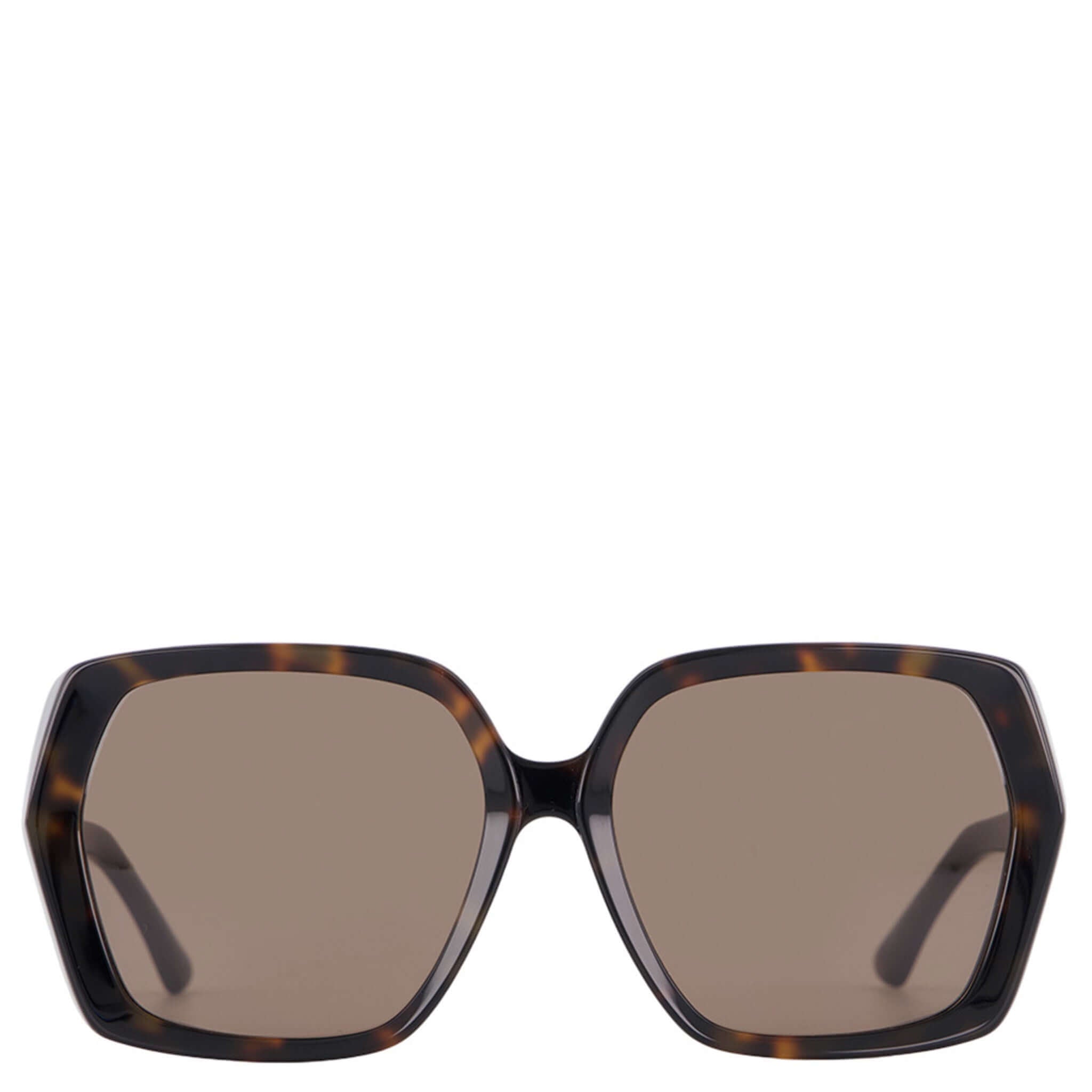 Sunglasses with tortoiseshell frame and brown lenses on a white background