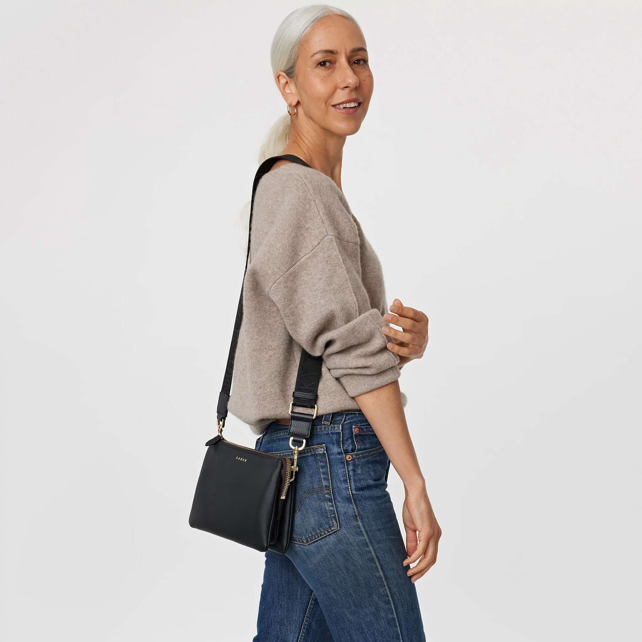 Saben Feature Webbing Strap - Black You Lucky Thing on black crossbody bag, adjustable cotton webbing strap with gold hardware