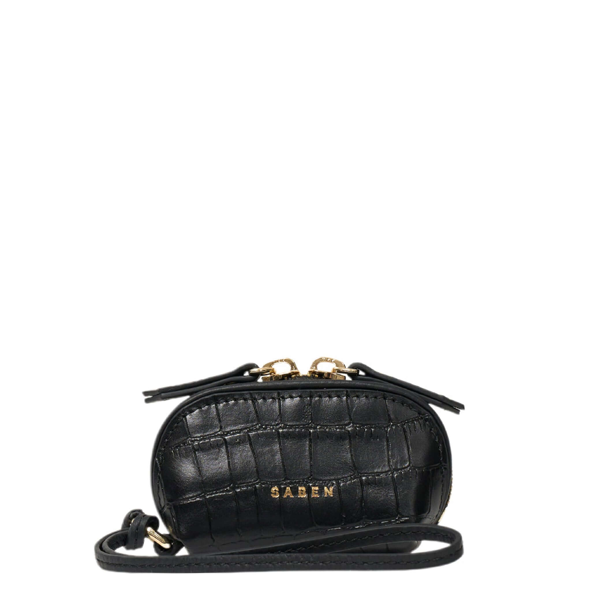 Black quilted handbag with gold accents on a white background