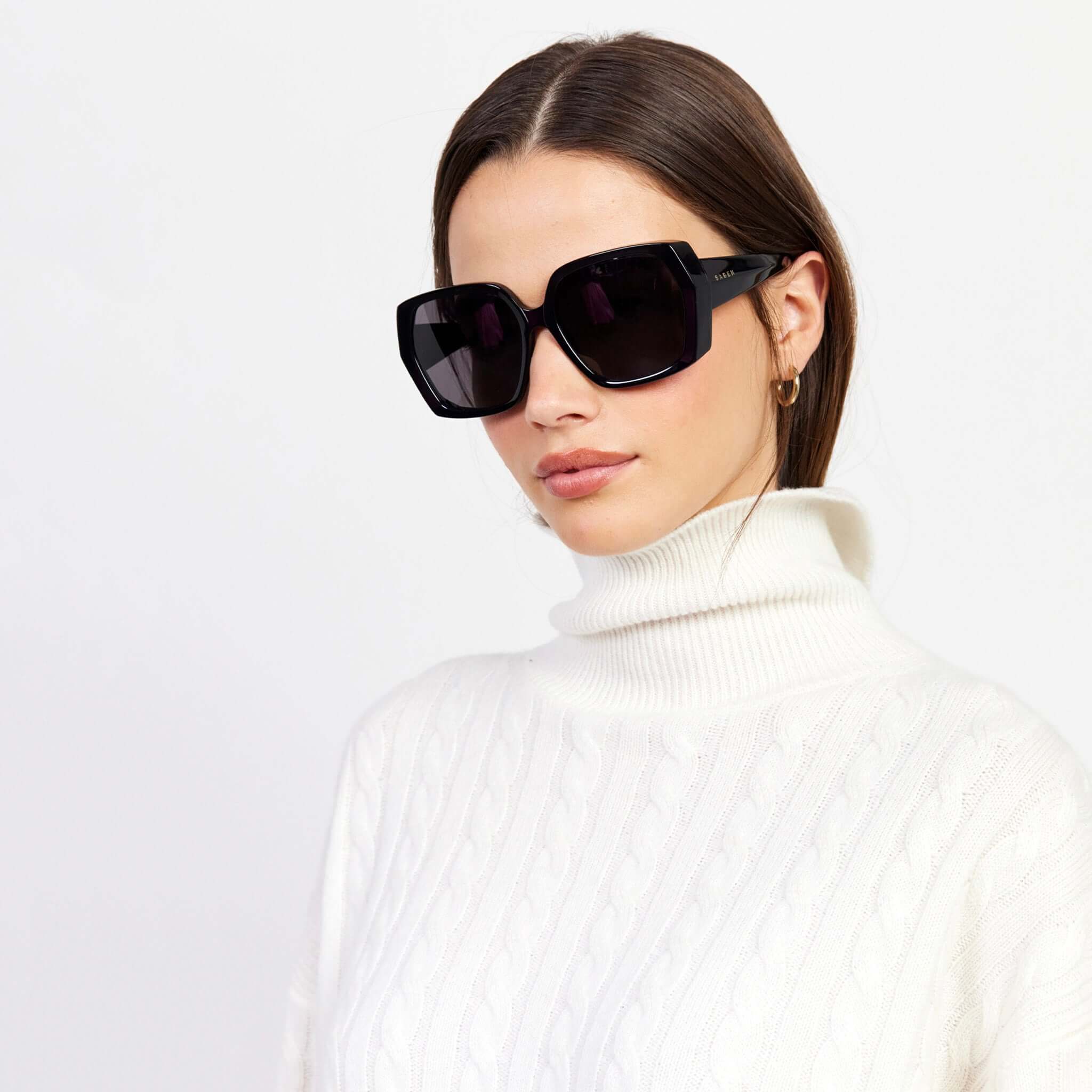 Alt Tag: Saben Eyewear Remi Sunglasses - Black oversized hexagonal acetate sunglasses on model, bold 70s-inspired statement shades