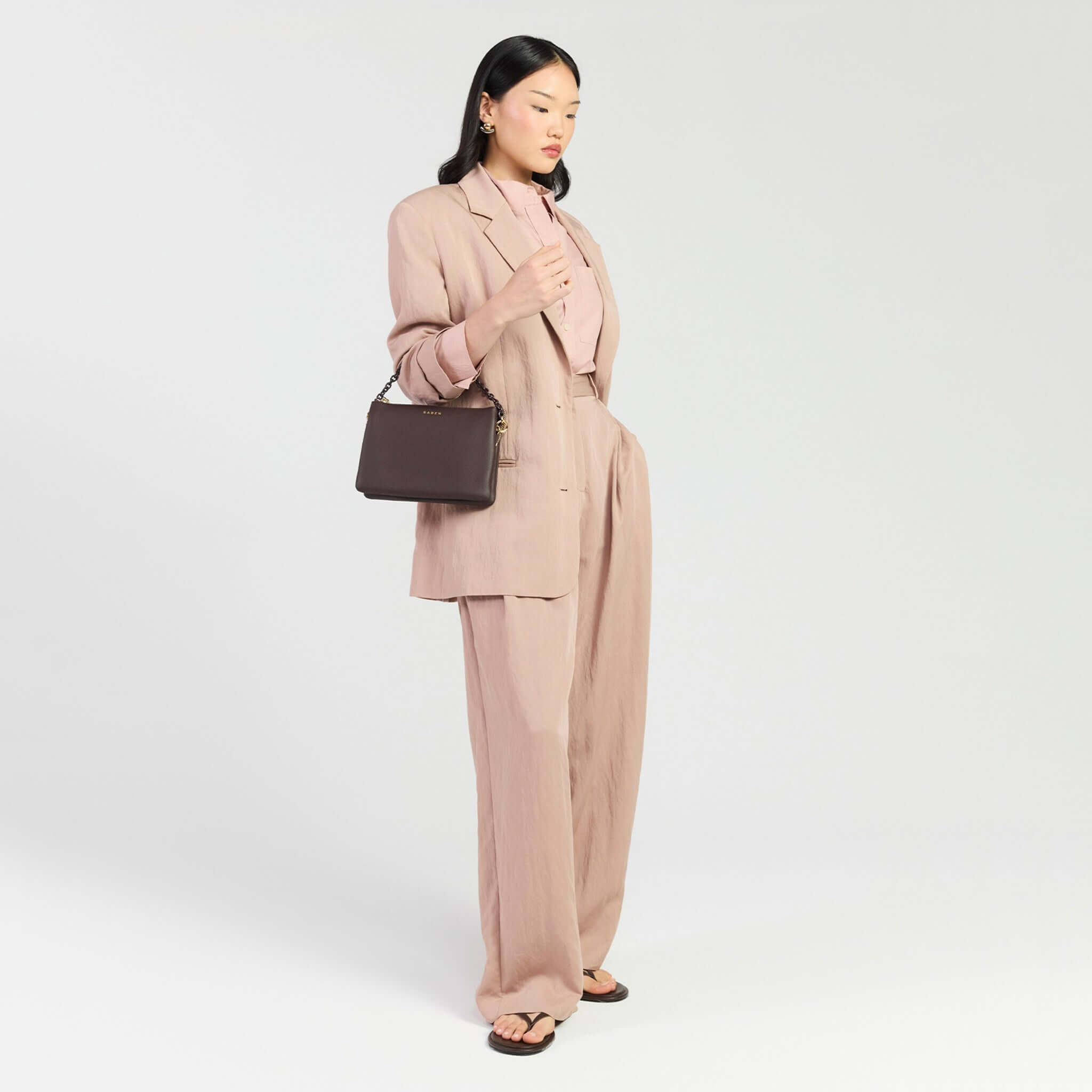 Saben Tilly's Big Sis Crossbody Bag - Cacao styled with a chic outfit, showcasing its versatility and elegance.