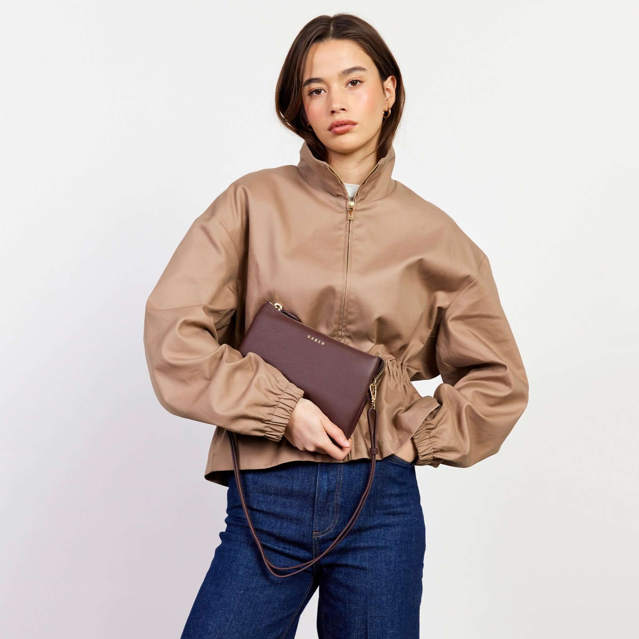 Alt Tag: Saben Tilly's Big Sis Crossbody Bag - Espresso pebbled leather crossbody clutch with strap, shown worn on model