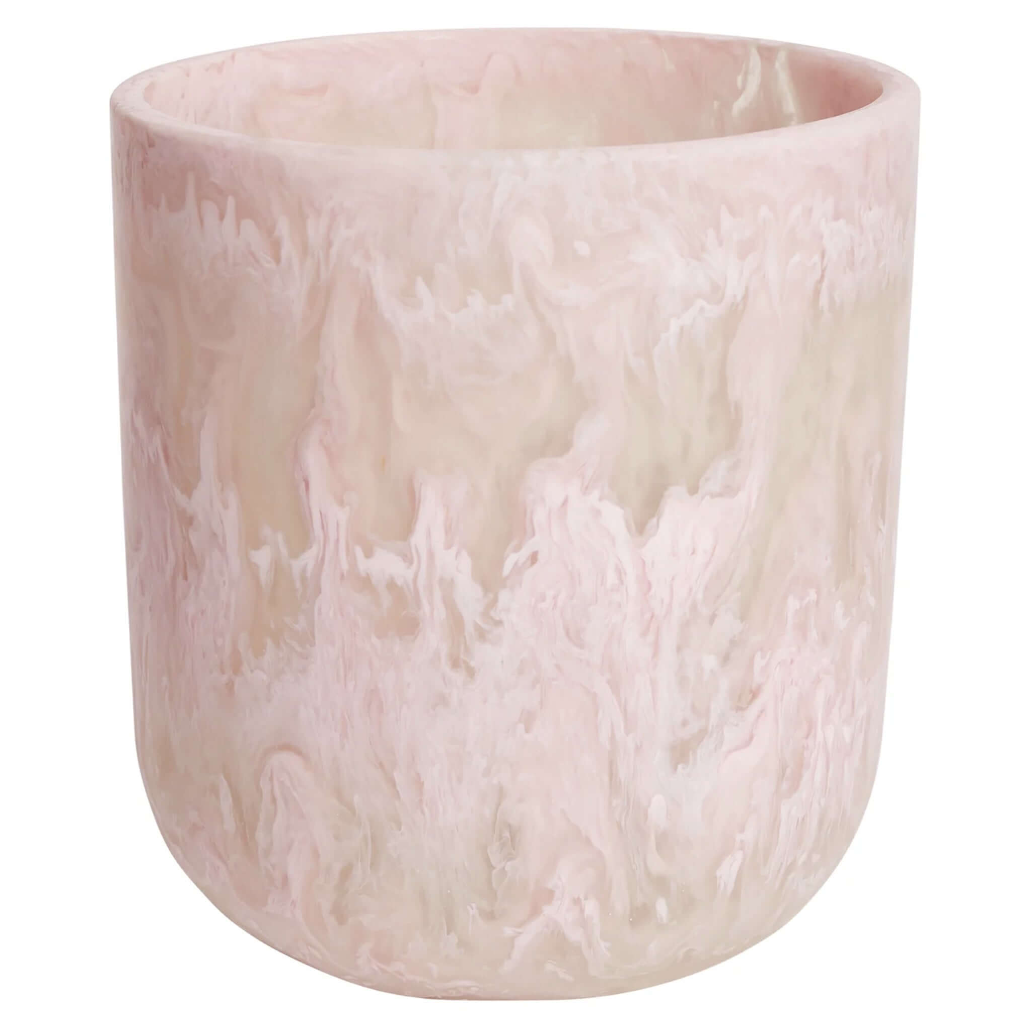 A hand-poured pink resin vase with a mid-century inspired design.