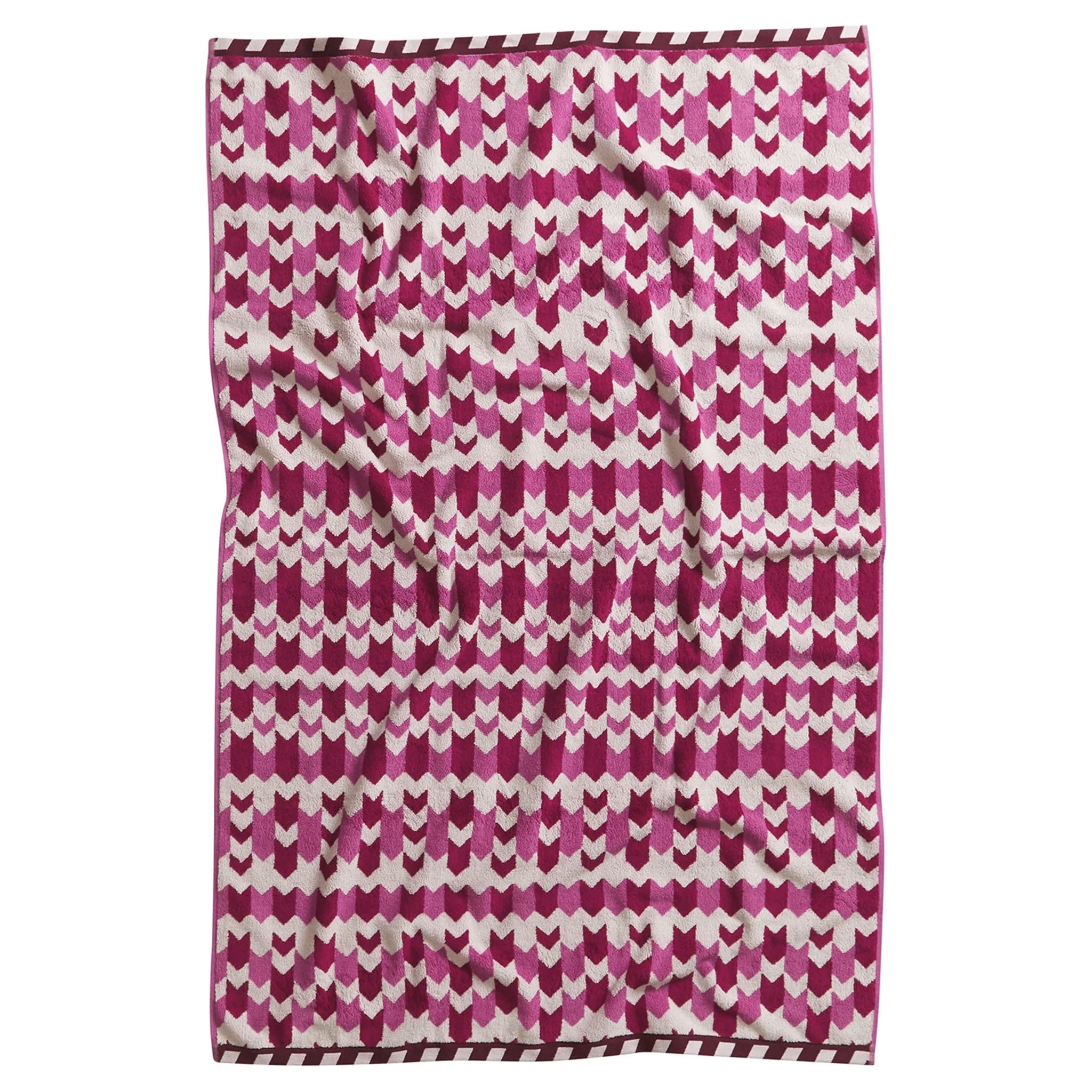 A fuchsia-colored bath sheet with a geometric pattern, made from organic cotton terry toweling, with bound edges.