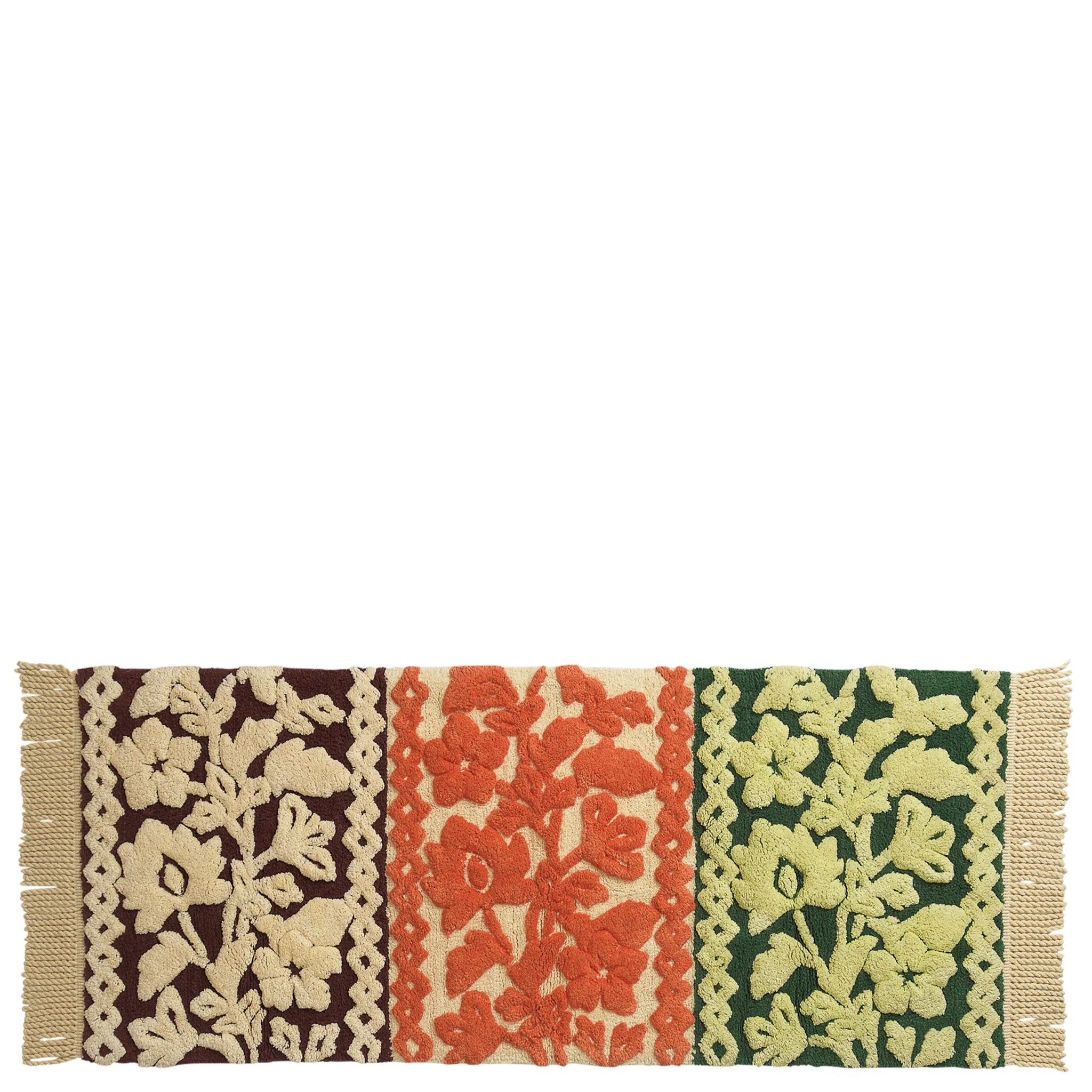 Decorative bath mat with floral patterns in brown, red, and green on a white background