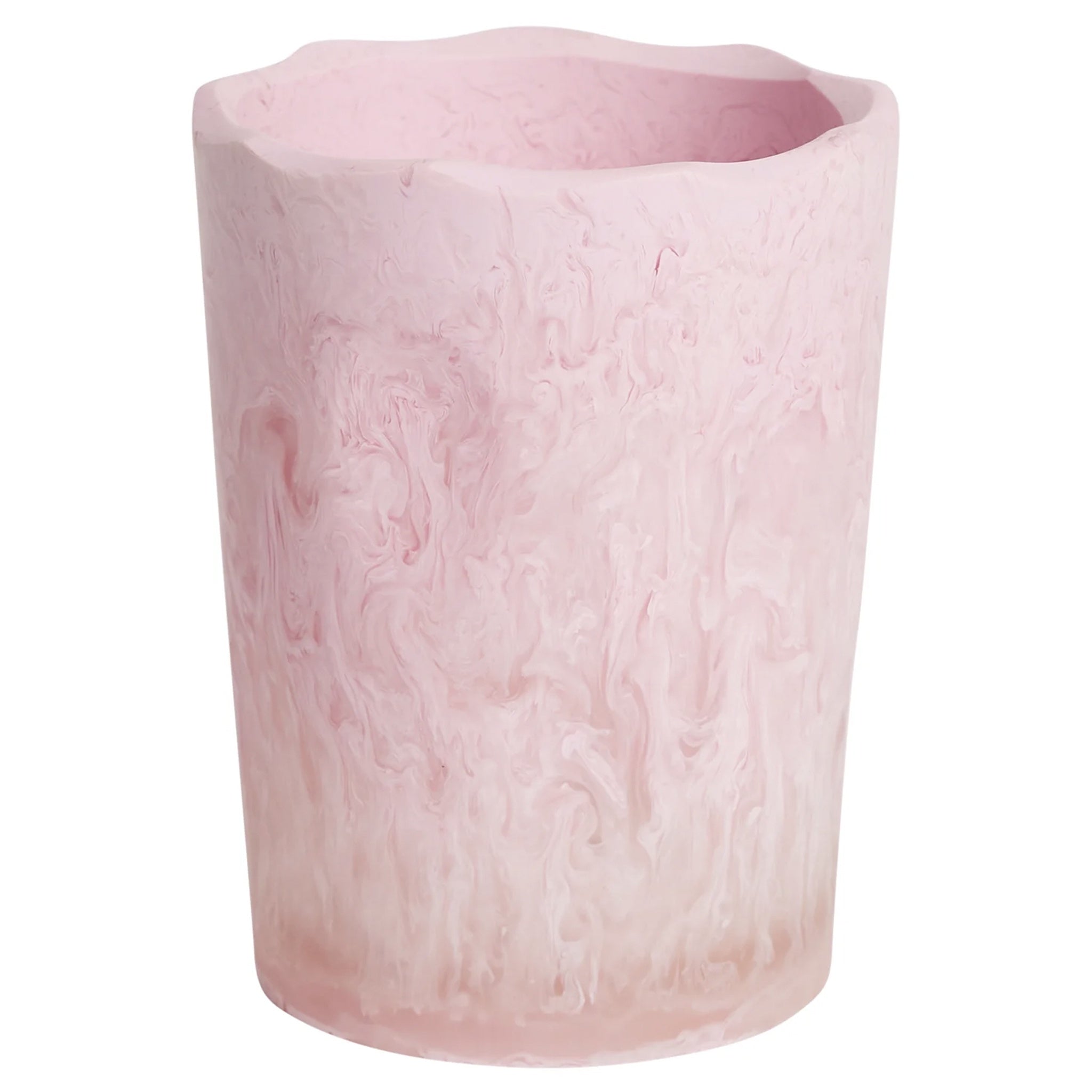 A pink resin drinking vessel with an irregular, organic shape.