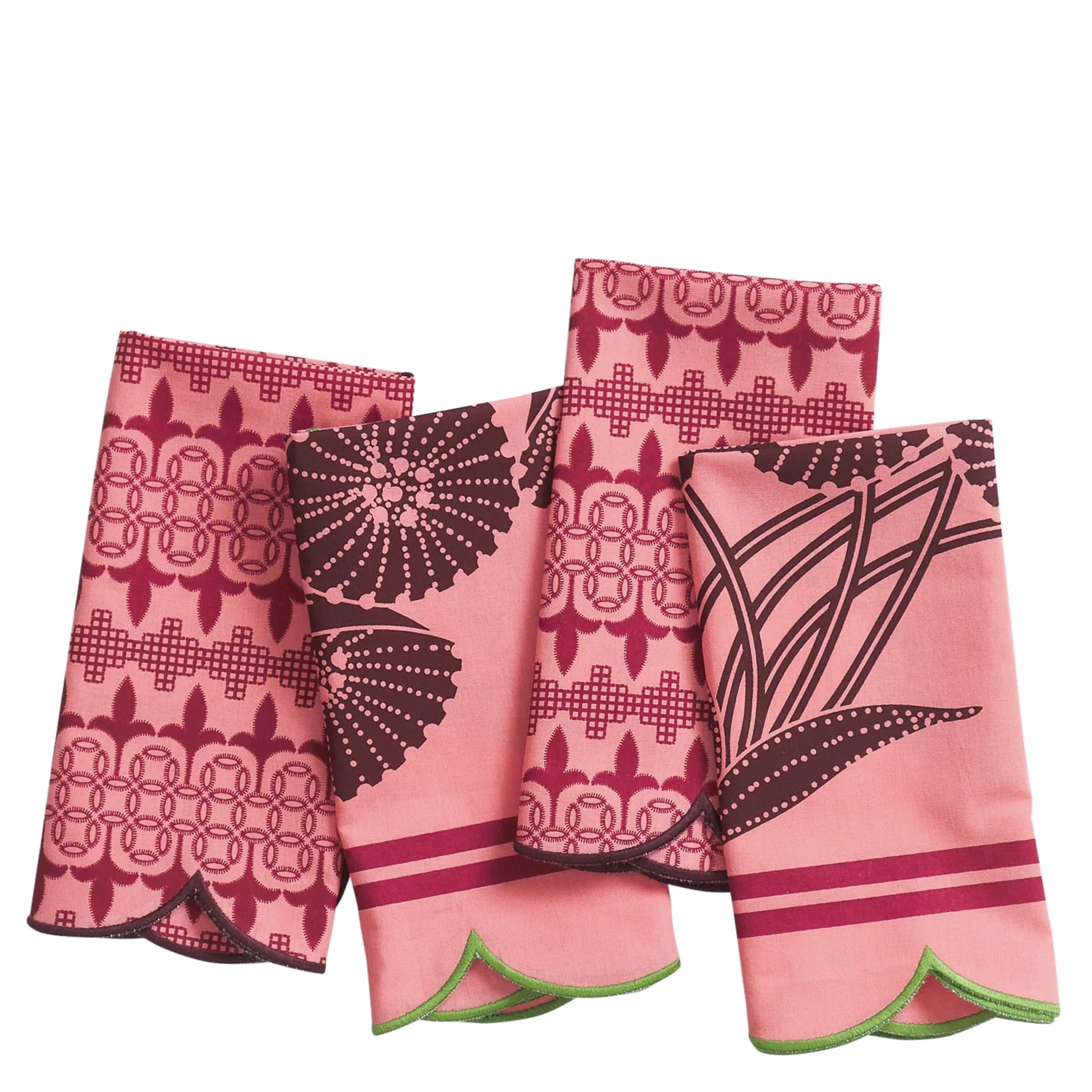 Set of pink and black patterned napkins on a white background