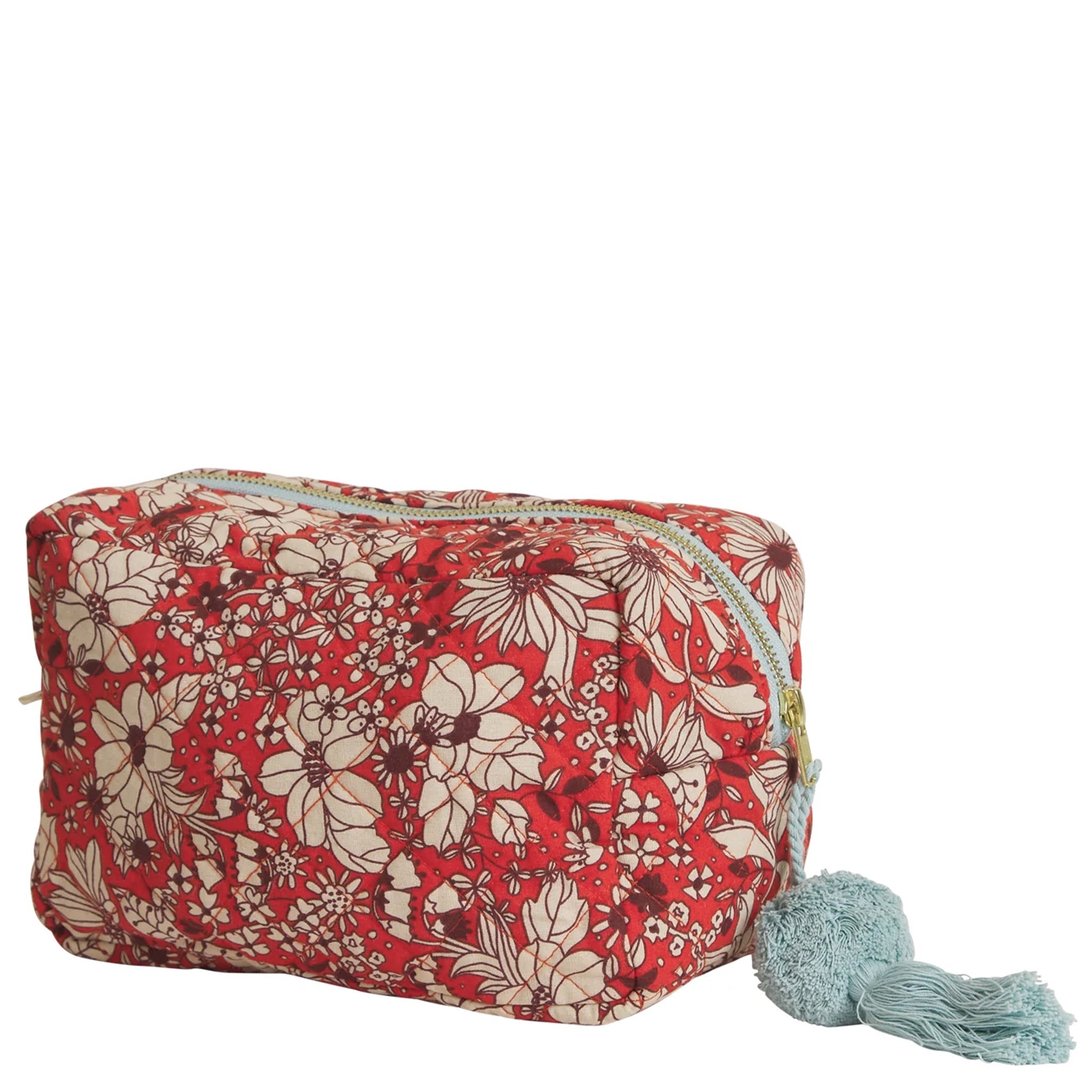 A red floral organic cotton beauty bag with a tassel detail.